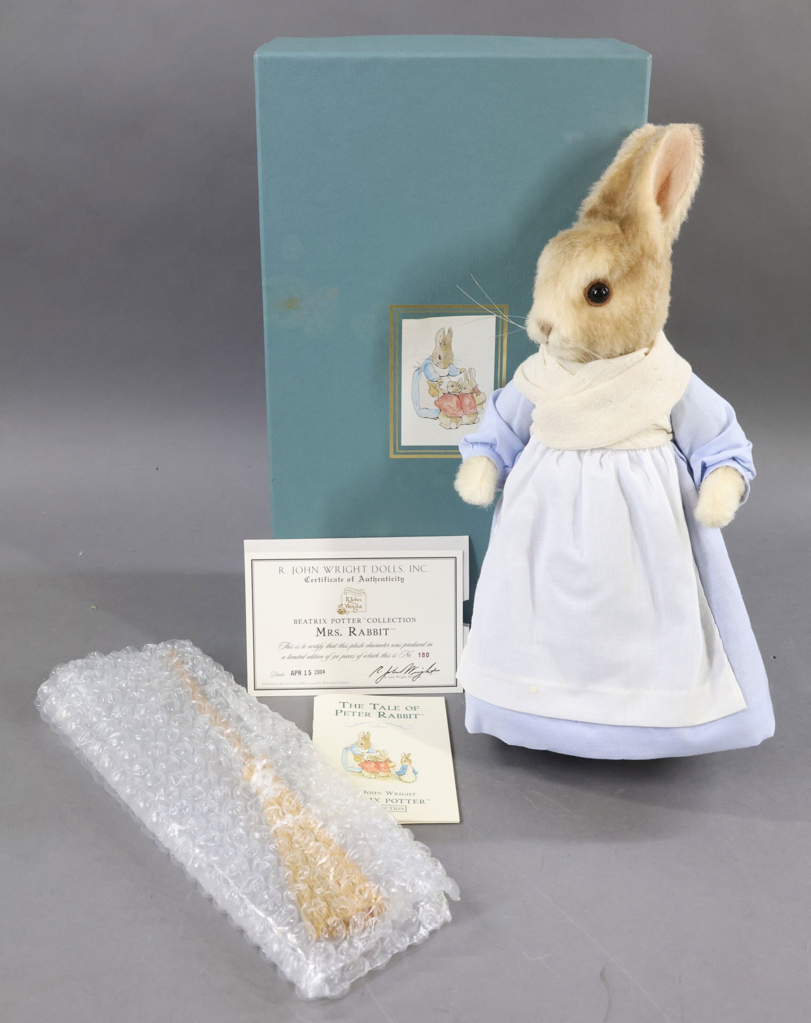 R. JOHN WRIGHT.: BEATRIX POTTER COLLECTION. 14" 2004 "Mrs. Rabbit", OB. 180/500. COA. Condition: Mrs. Rabbit is MINT. Box lid has age discoloration. This lot is being sold AS IS.