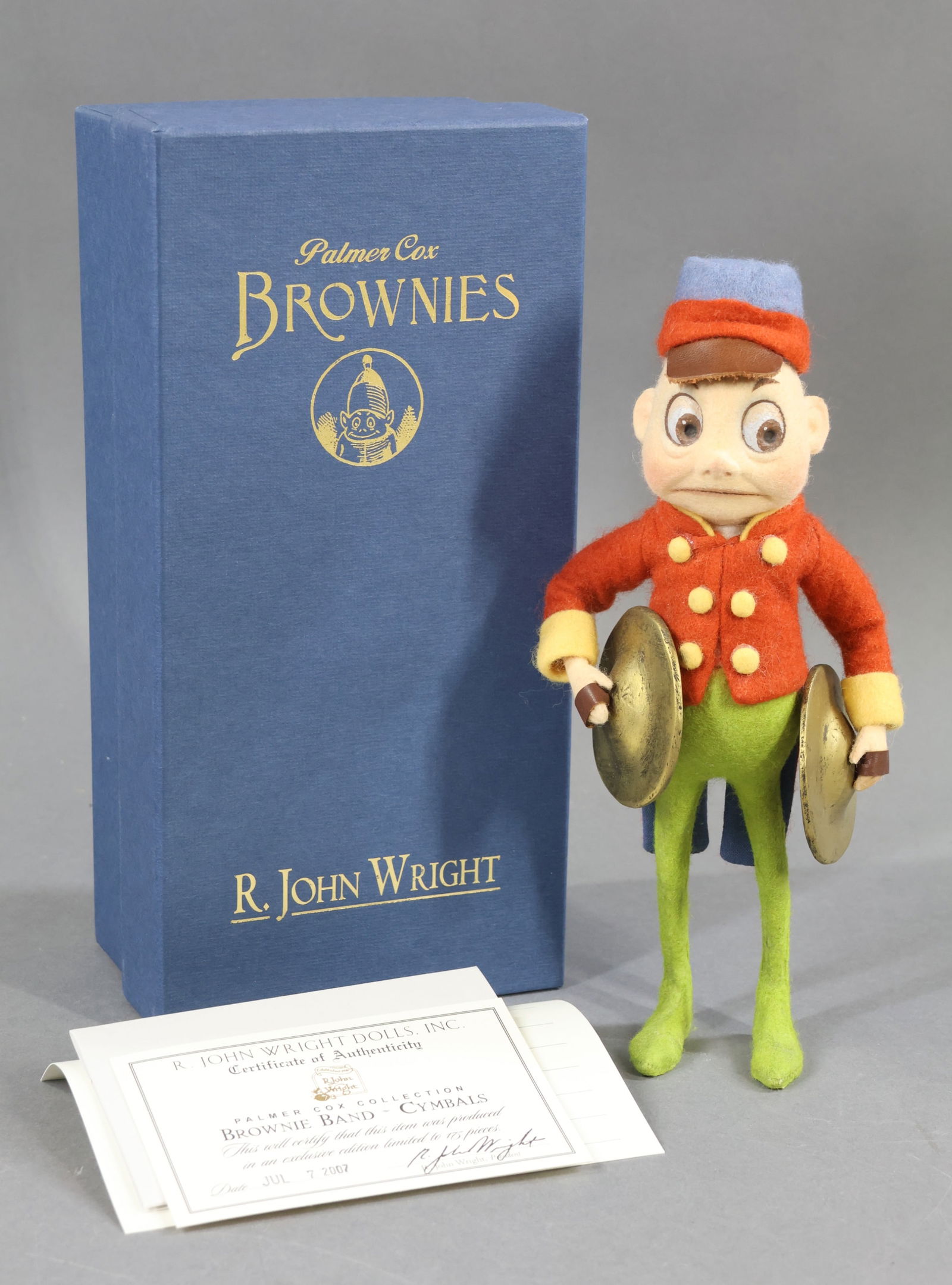 R. JOHN WRIGHT.: MIB 8" 2007 "Brownie Band - Cymbals" part of the Palmer Cox Collection. Ltd. Ed. 175. COA. Outer sleeve. Brownie pin. This lot is being sold AS IS.
