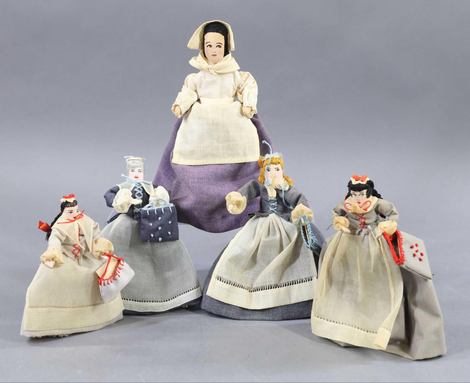 AMERICAN CLOTH DOLLS.: LOT of (4) 1943 "Benigna" Moravian female dolls. Each doll carries a cloth bag with statement inside: Created and made by The Bethel Circle of The King's Daughters, First Moravian Church, Bethlehem,