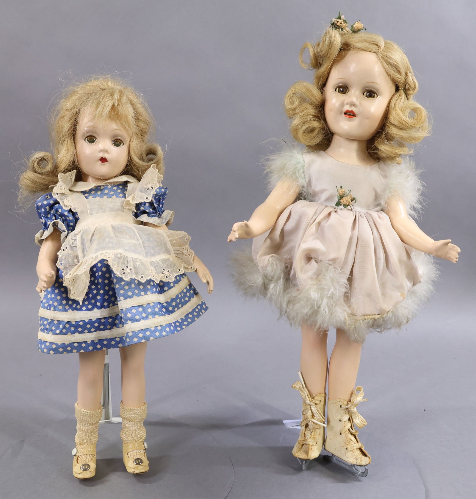 COMPOSITION DOLLS.: Pair of all original MADAME ALEXANDER dolls with sleep eyes, honey blonde human hair wigs, tagged clothing. 14" 1936 "Alice in Wonderland" with the Wendy Ann face, swivel waist body. Oilcloth shoes. 1