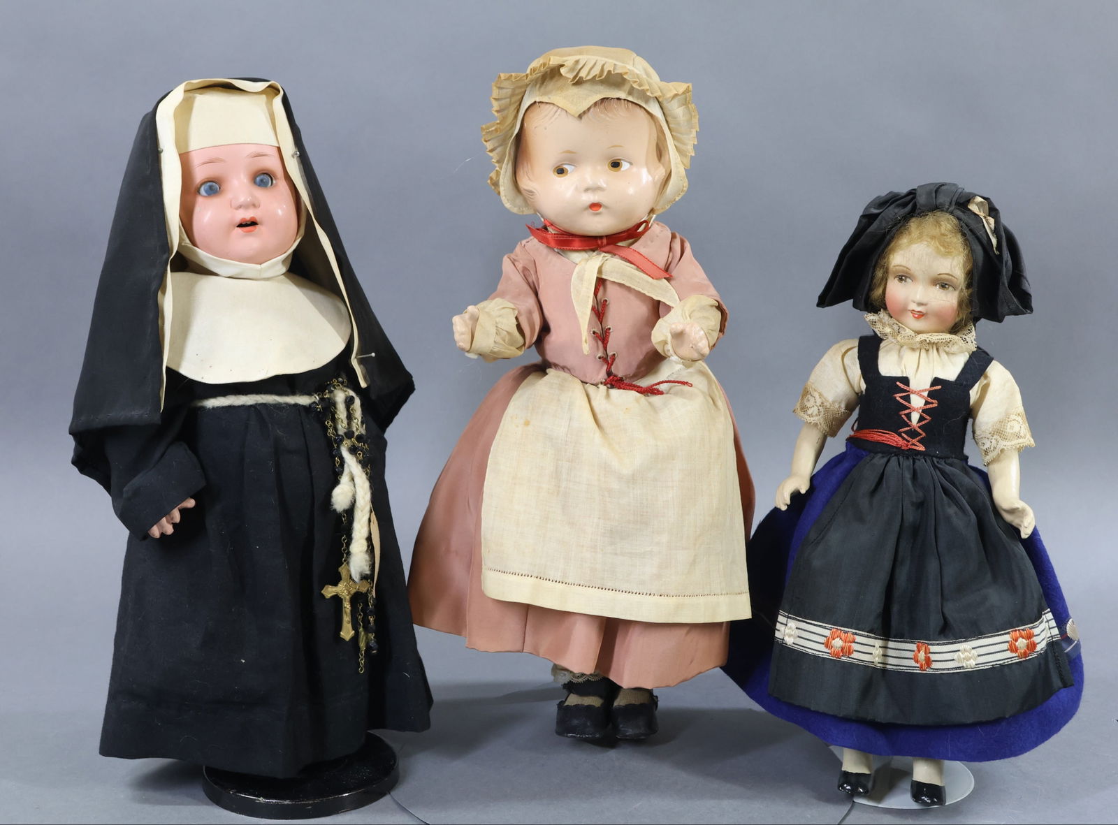 COMPOSITION/OTHER DOLLS.: LOT of (3) dolls. All of these dolls have 5 pc. bodies. Composition - 12" Unmarked Patsy/type doll with painted hair, features. Dressed in original Moravian style costume of cotton and rayon
