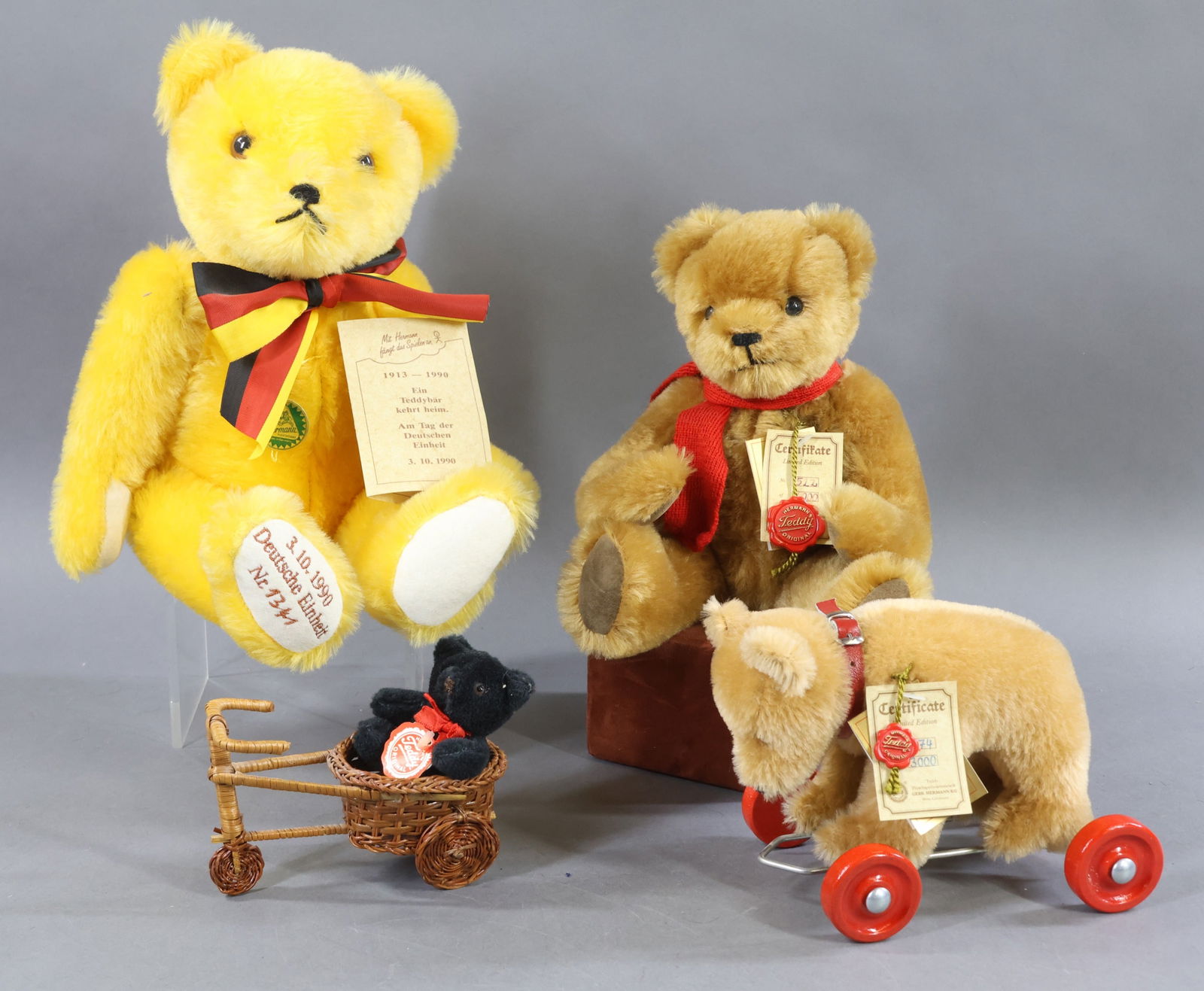 GERMAN HERMANN BEARS.: LOT of (4) tagged HERMANN Bears. MOHAIR - Pair of Bears that have swivel necks, fully jointed. 11" Camel Teddy 522/2000. 15" Yellow "Teddybar" 1913-1990 Dated 3-10-1990. Foot embroidered Nr.