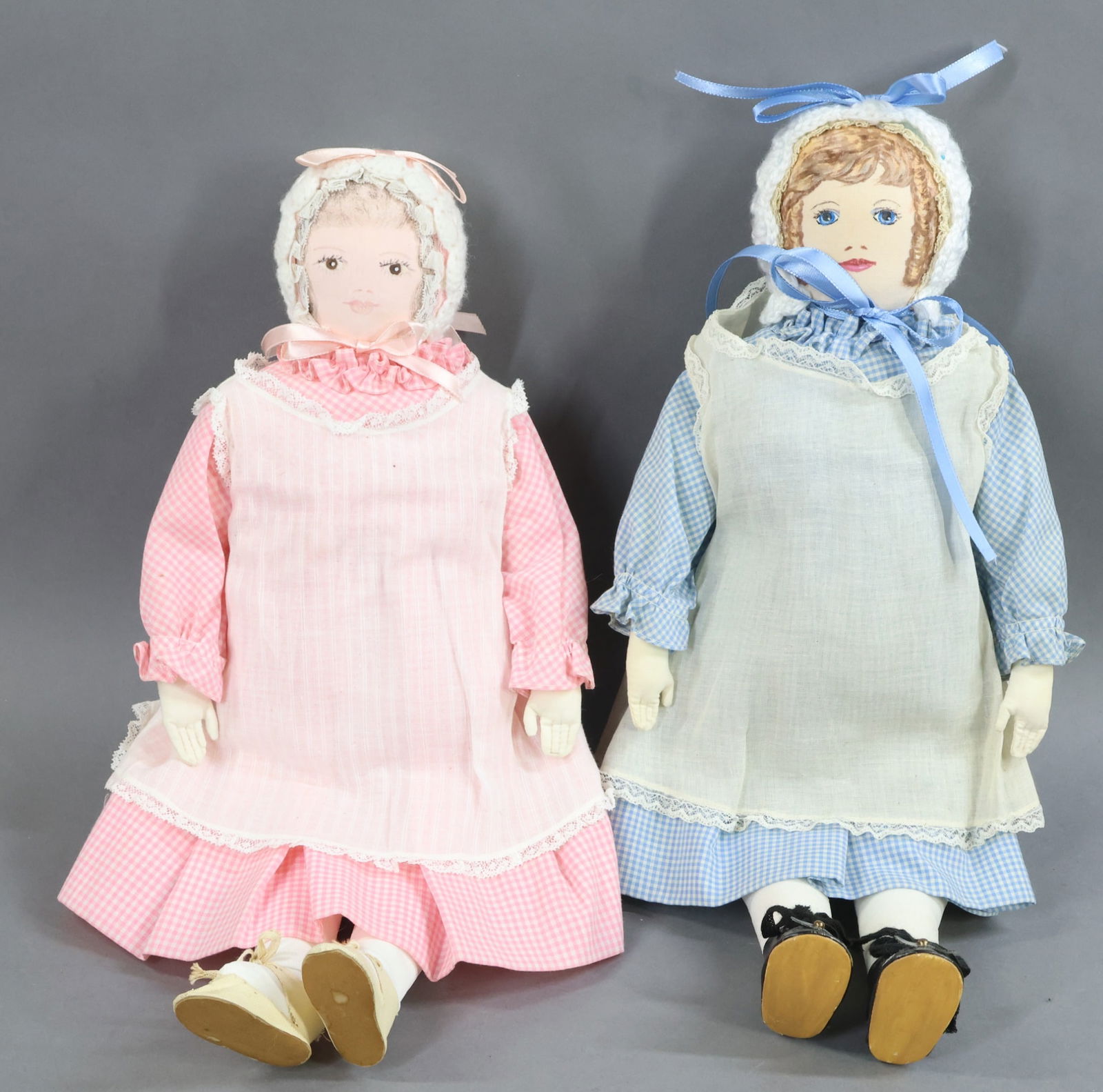 AMERICAN CLOTH DOLLS.: Pair of all original 18" "Polly Heckewelder" dolls made by the Moravian Church Ladies Sewing Society in Bethlehem, PA. The blonde appears to be from the 1970's and the brunette from the 1960's