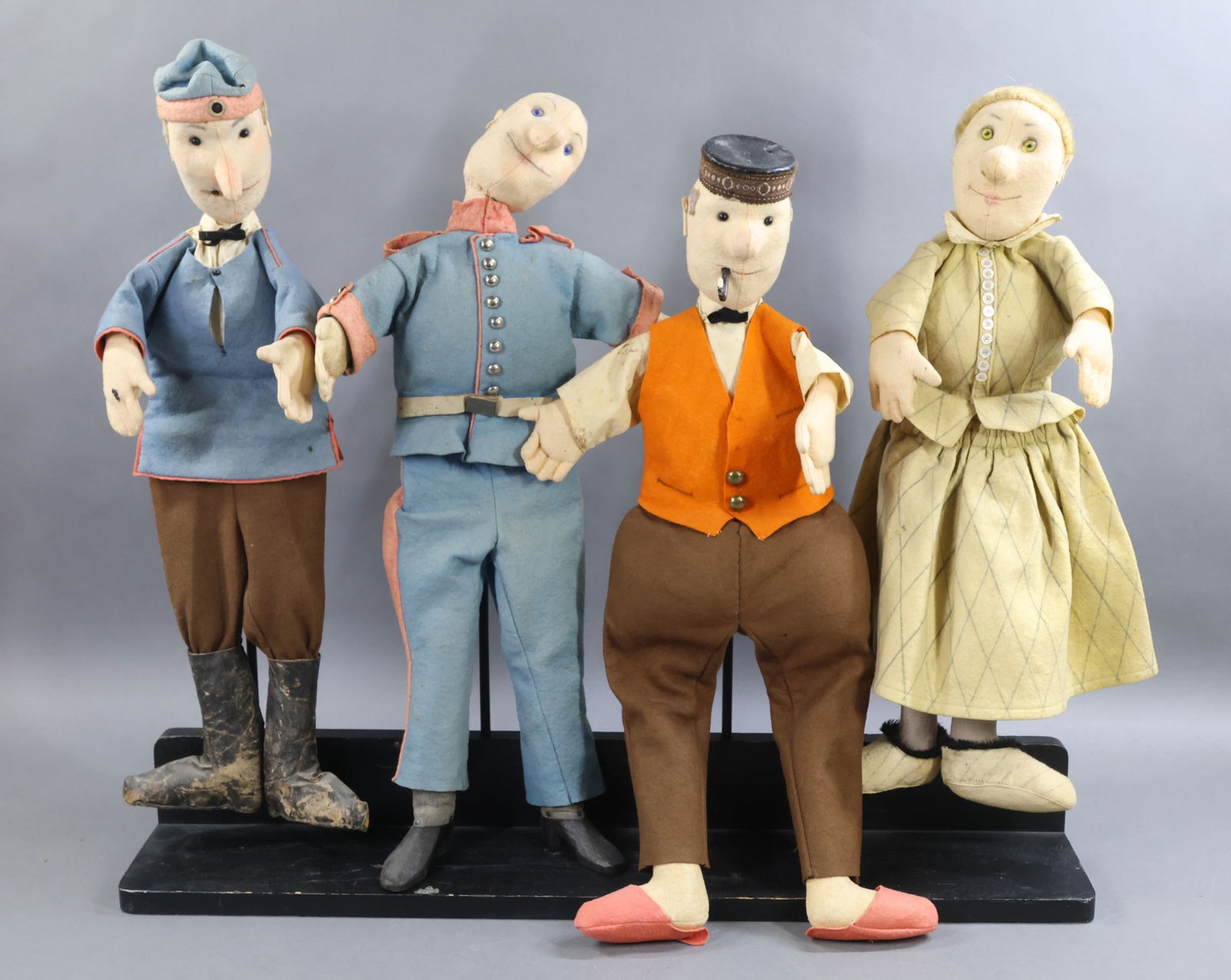 CLOTH DOLLS/PUPPETS: Set of (4) marked 23" felt puppets by artist Albert Schlopsnies. They are stamped with Albert's name. He studied at the Munich Academy of Fine Arts from 1913. He designed catalogs for the company
