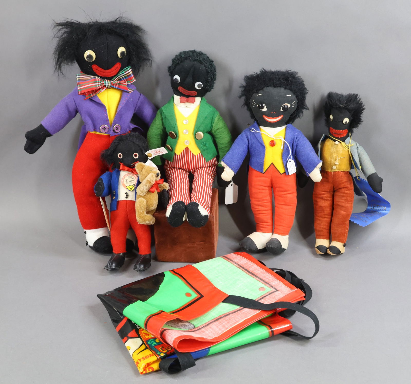 BLACK DOLLS.: LOT of (5) cloth GOLLIWOG dolls, apron. 9 1/2" 1995 STEIFF with 4" camel mohair Bear. "Golli G. & Teddy B." Incised brass button, white tag, 651861, 1238/1500. 11" Tagged: Made in England for Lenart
