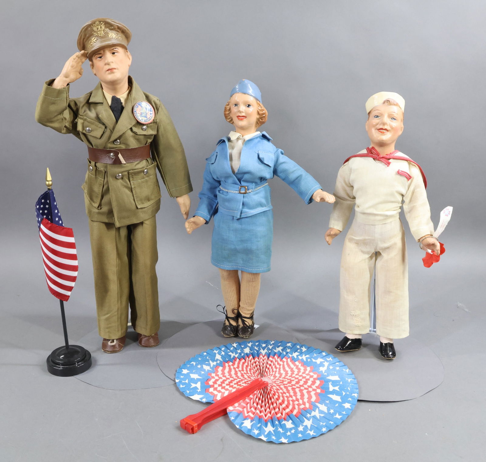 DOLLS IN UNIFORMS.: LOT of MILITARY. (3) Composition dolls made in the 1940's by FREUNDLICH Novelty Corp, NY. 18" All original "General Douglas MacArthur" portrait doll with molded hat, original khaki uniform. Original