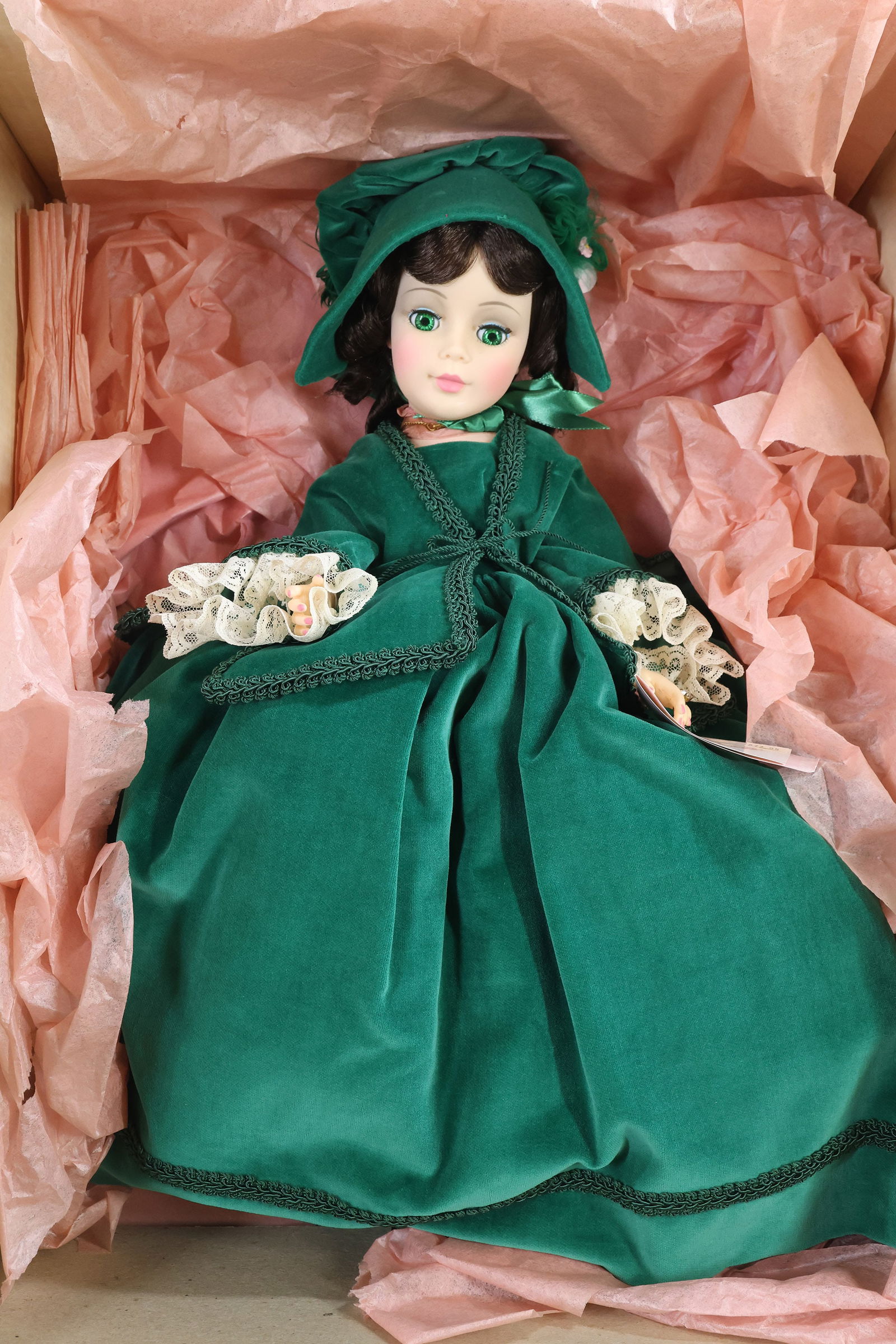 MADAME ALEXANDER PORTRAIT DOLLS.: MIB 21" "Scarlett" doll in green velvet, 1979-1985, #2240. OSS. This lot is being sold AS IS. (Prior to the photography, this doll had NBRFB.)