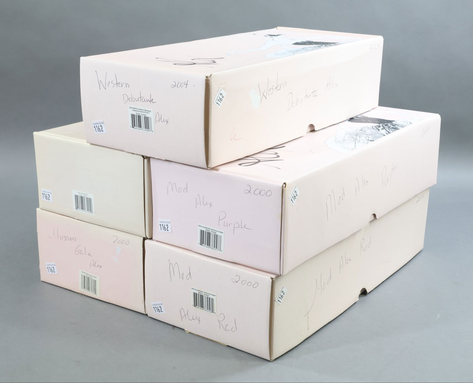 MADAME ALEXANDER ALEX DOLLS.: LOT of (5) MIB NRFB 15" "Alex" dolls. 2000 "Museum Gala", 1878/4000. COA. 2004 "Mod Alexandra Fairchild Ford", (purple), DLTD/2500. COA. 2004 "Mod Alexandra Fairchild Ford", (red), 0688/2500. COA.