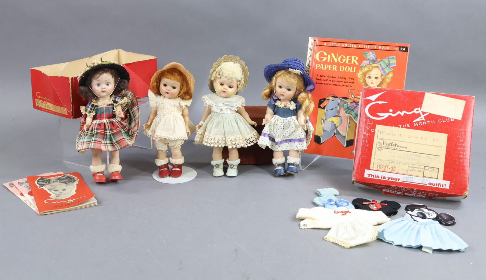 1940's-1960's DOLLS.: LOT of 8" dolls, accessories. Lot of (3) VOGUE "Ginny" painted lash strung dolls. (No boxes. ) Doll 1) golden blonde doll with pigtails, dressed in original unmarked dress, matching decorated straw ha