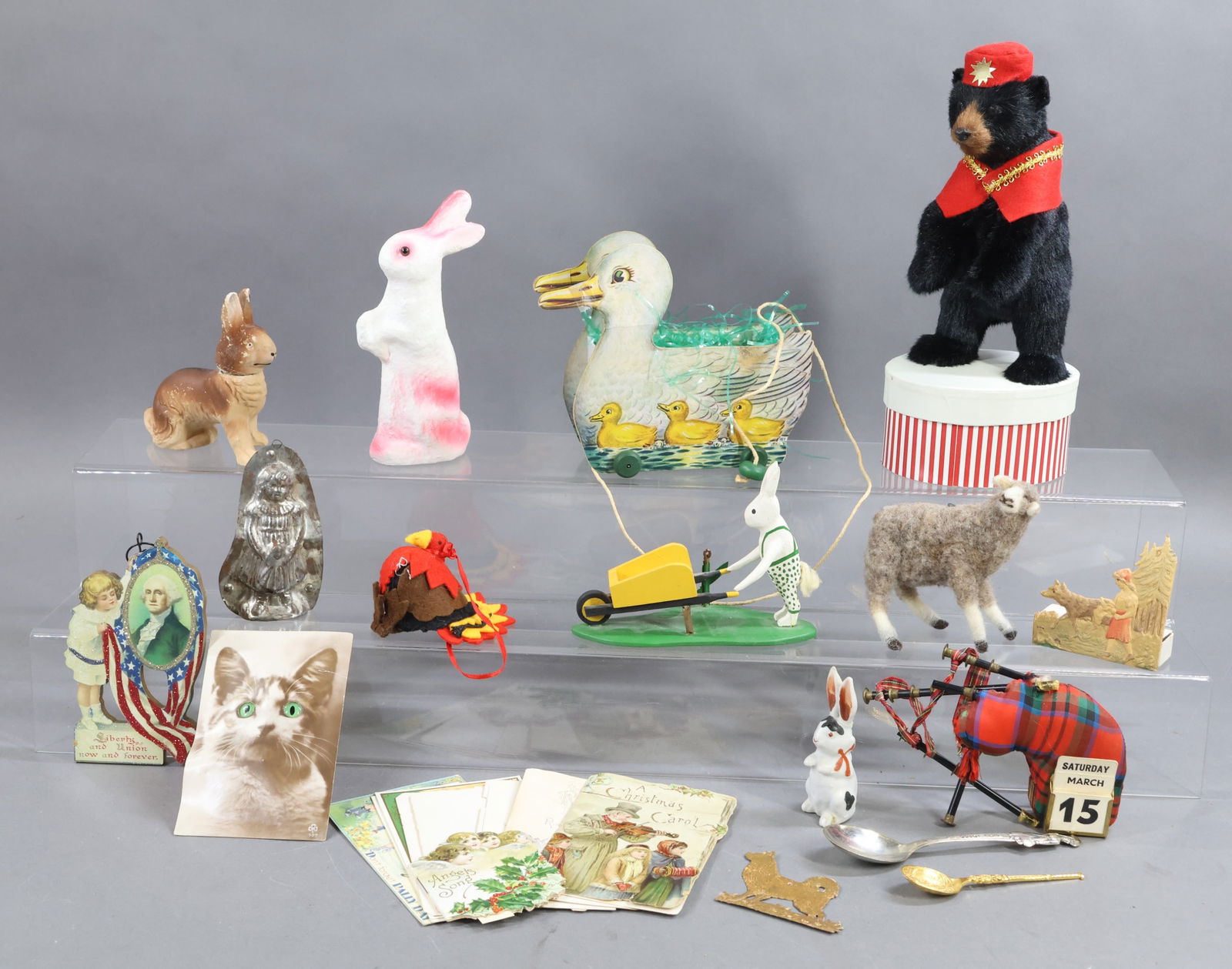 HOLIDAY/NOVELTIES.: HOLIDAY & NOVELTY. Holiday - Easter: Fanny Farmer cardboard Duck pull toy candy container. 7" Chalk Rabbit. China Rabbit. 4" Hand carved Rabbit pushing wheelbarrow. Felt Thanksgiving turkey.