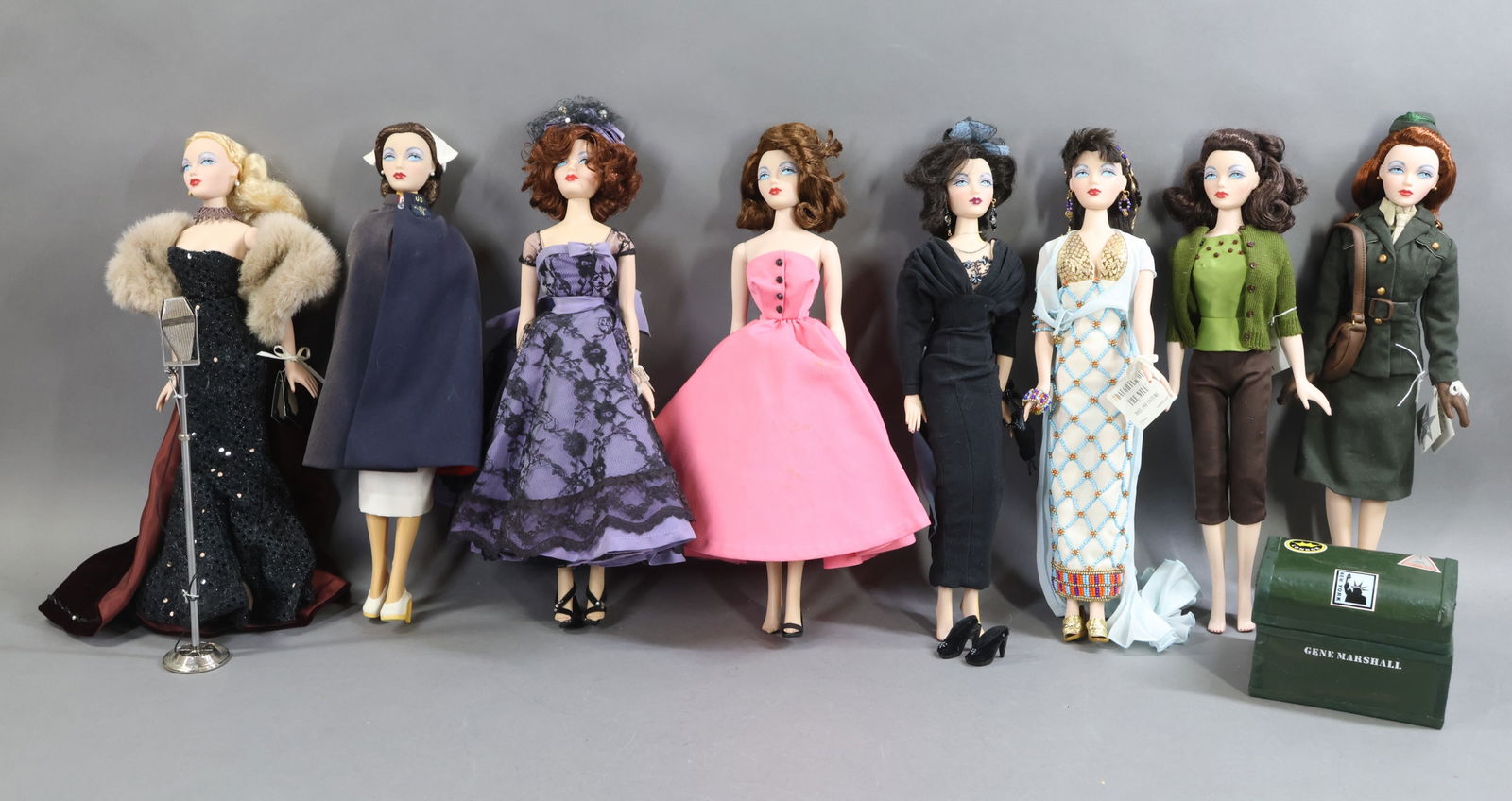 CONTEMPORARY ARTIST DOLLS.: LOT of Mel Odom's GENE. (8) Dolls, NO boxes. Tagged - "Daughter of The Nile". "Jazz Note". "Creme De Cassis". "Hi-Fi" (missing shoes). "USO" w/ trunk, microphone. (1) Tagged but un-named. No tags -