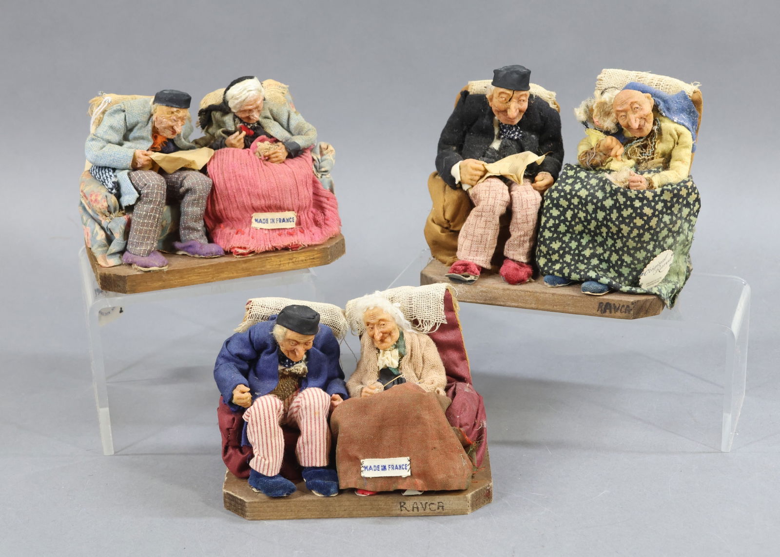 RAVCA.: LOT of (3) Bernard Ravca "Bread Crumb" couples. Each set is marked Made in France or have the RAVCA medallion. (2) Wooden bases are marked RAVCA. They are each 4 1/2" T x 5 1/2" W x 3" D. (1) Is