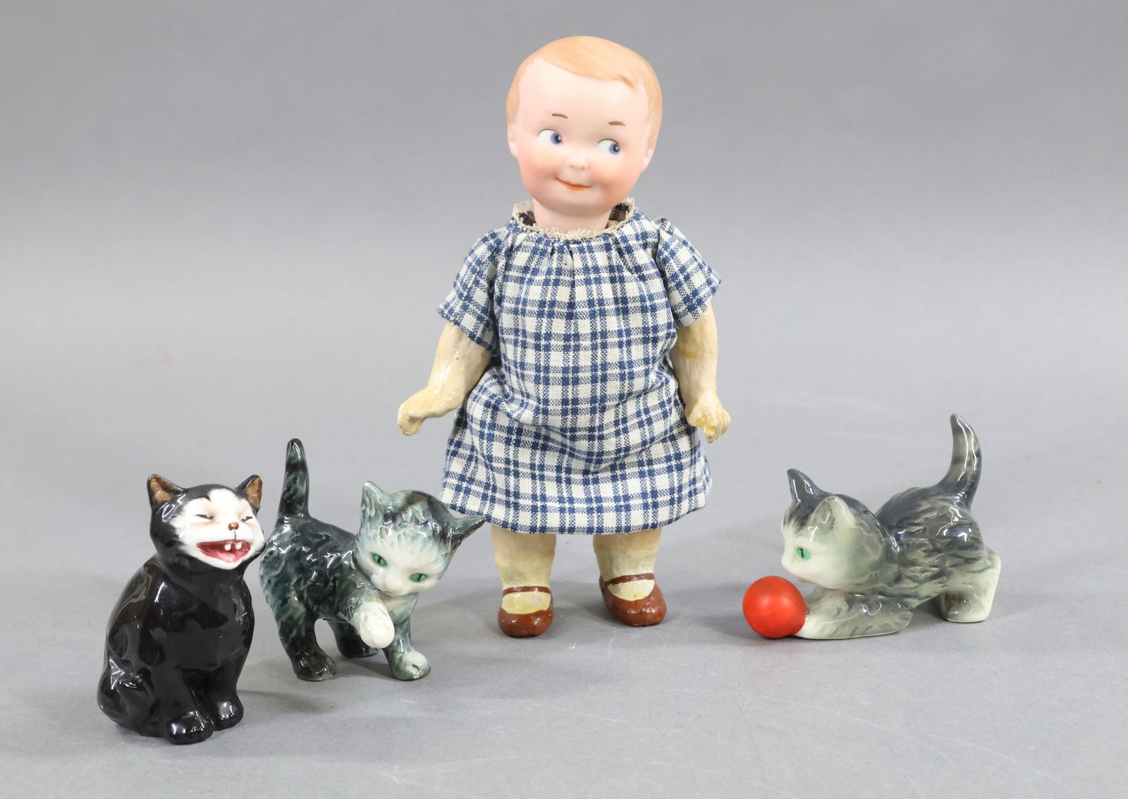 BISQUE GOOGLY EYE DOLLS.: LOT. 6 1/2" 254 A.11/0.M GERMANY DRGM solid dome doll with painted features, dark blonde hair. Blue side glance intaglio eyes, watermelon smile. 5 Pc. papier mache toddler body with painted shoes, soc