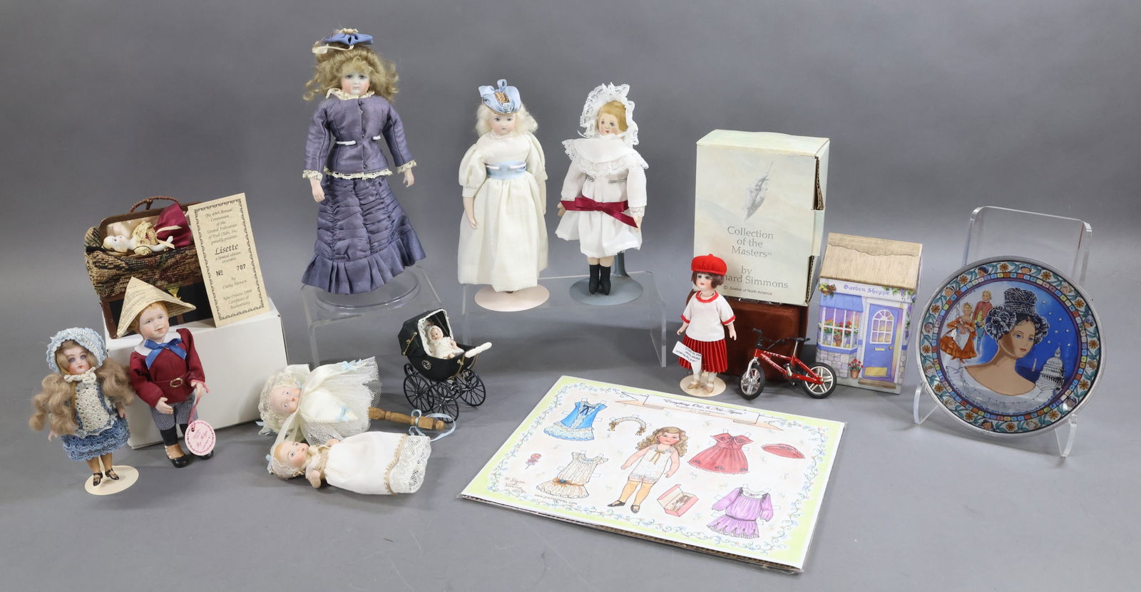 CONTEMPORARY/UFDC DOLLS.: LOT of UFDC/Regional souvenir, luncheon dolls made by different artists. Region 13 - Letitia Penn luncheons: Heidi Ott carriage/baby doll. Richard Simmons "Lily" doll (undated, LPDC). 2013 Cloth doll