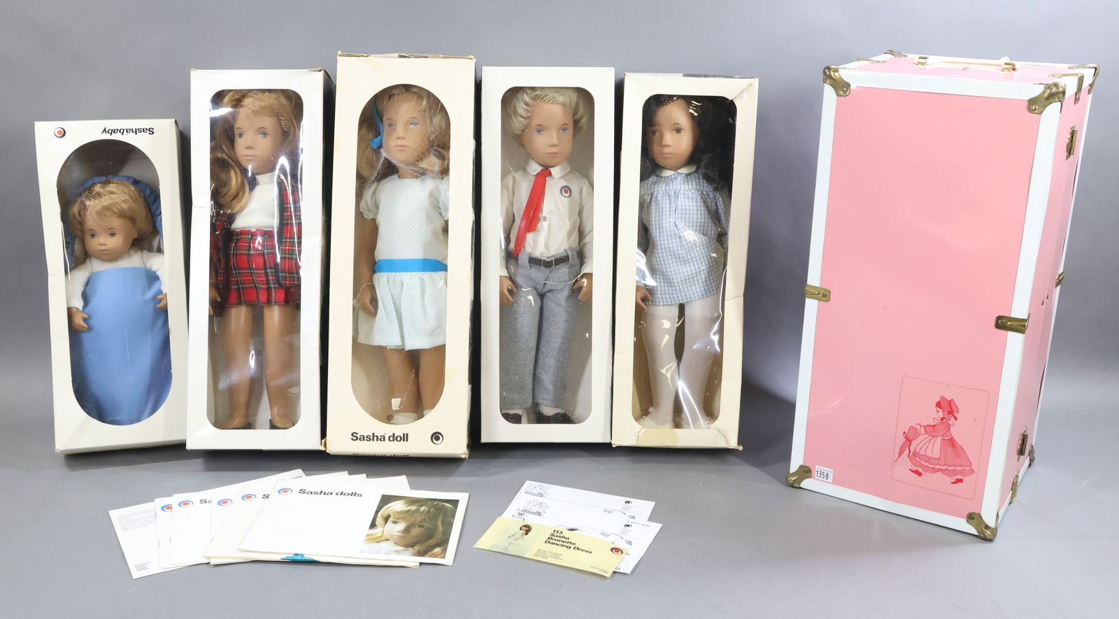 CONTEMPORARY ARTIST DOLLS.: LOT of (5) SASHA dolls and trunk of original clothing. These dolls are in OB but not necessarily their OB. Correct boxes - 514S "Baby Rosie Honey Hair". 116S "Sasha Honey Blonde Party". 314S "Gregor B