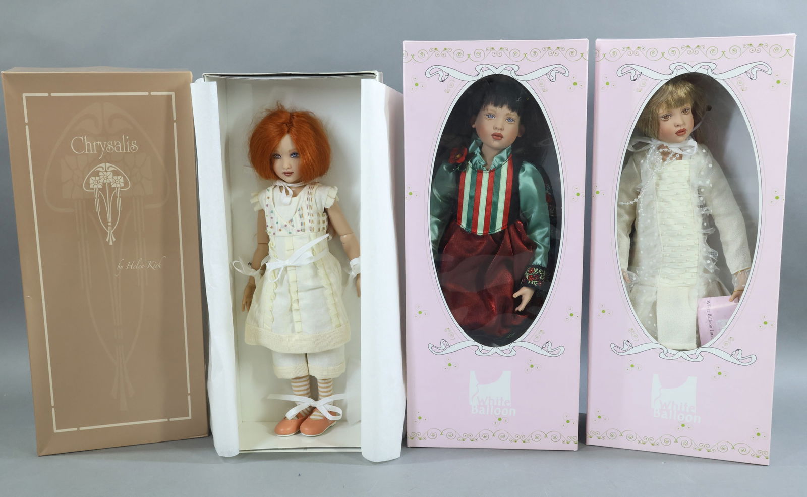 CONTEMPORARY ARTIST DOLLS.: LOT of (3) dolls by artist Helen Kish. Pair of WHITE BALLOON Wonder's of a Winter's Night - MIB"Jennifer", COA. "Nicole" in OB. COA. (This doll has been out of box.) Also - MIB CHRYSALIS "Lark