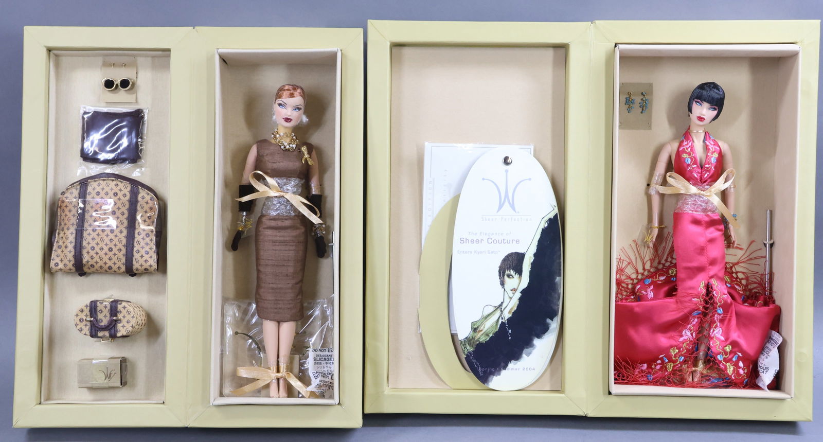 JASON WU.: Pair of MIB NRFB Fashion Royalty VOYAGES dolls. "Traveler by Nature" Veronique Perrin #91029. 2004-2005. Kyori Sato "Fierce Subject", #91043, 417/1000, COA. Sheer Perfection - The Elegance of Sheer