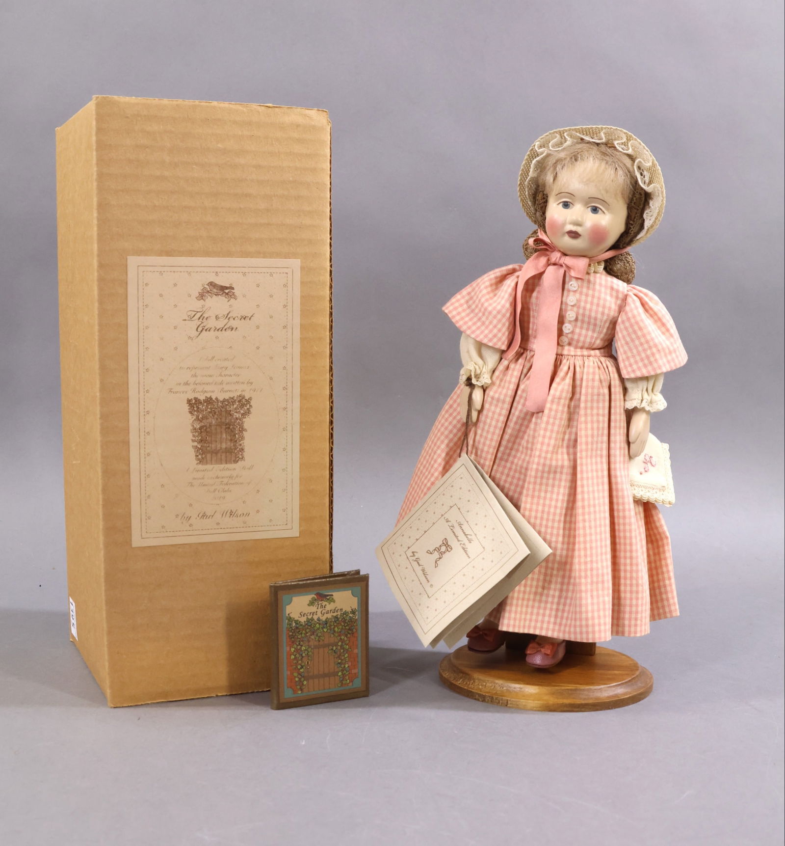 ARTIST DOLLS.: 9" MIB 2019 "Annabelle" by artist Gail Wilson made for the UFDC Convention, "The Secret Garden". Doll was inspired by Tasha Tudor's Alphabet Book "A Is for Annabelle" . Papier mache and cloth doll