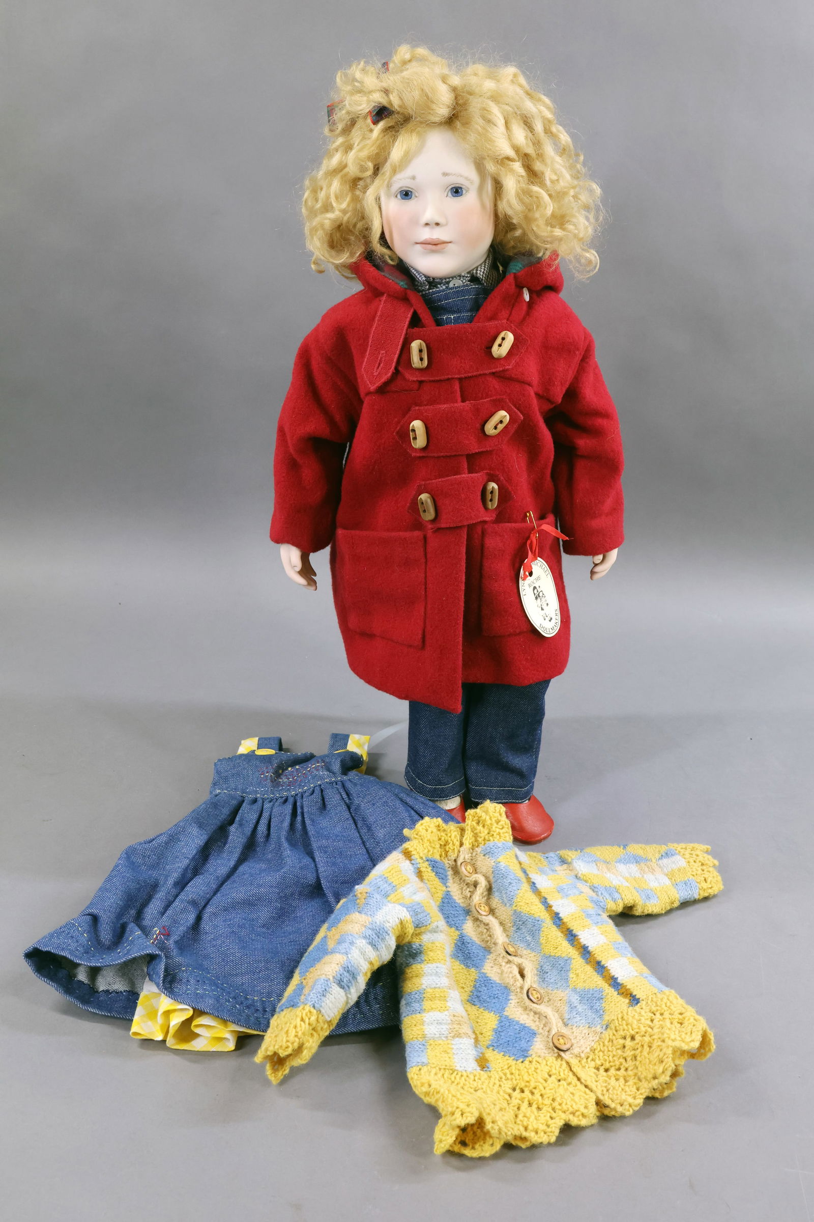 ARTIST DOLLS -ROCHE.: LOT. 20" MINT "Henrietta" doll by English artists Lynne & Michael Roche. Tag reads: Henrietta 27 MLynne Roche -94. Stationary blue eyes, curly honey blonde mohair wig. Bisque shoulder head, lower