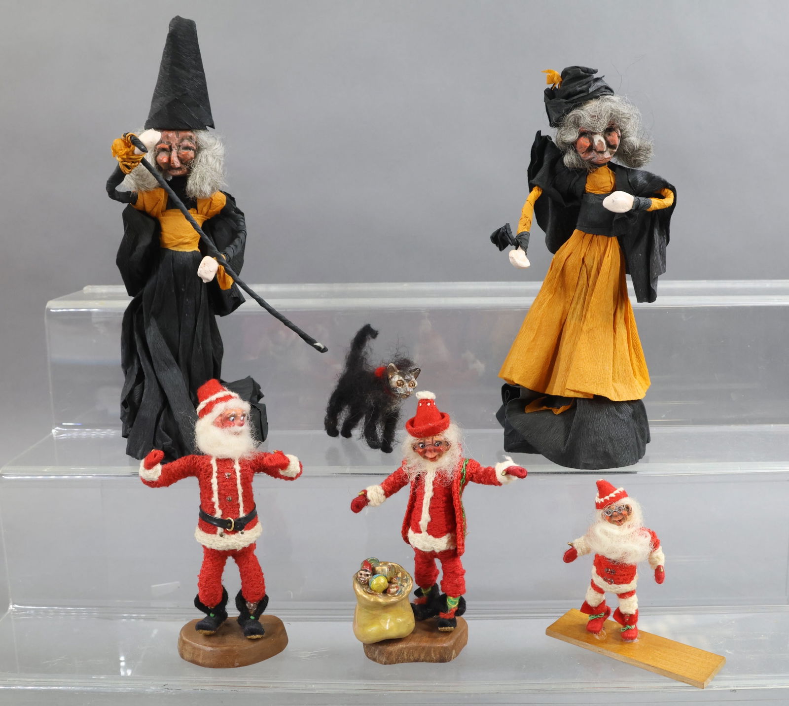 MINIATURE DOLL ARTIST DOLLS.: LOT of Holiday themed items by artist Eulalia S. Stauffer (7/30/1897 - 6/15/1970) of Pacific Grove, CA. (2) 6" Halloween Witches (on bases 7"). Black Cat. (3) Santas, (1) is signed on bottom and