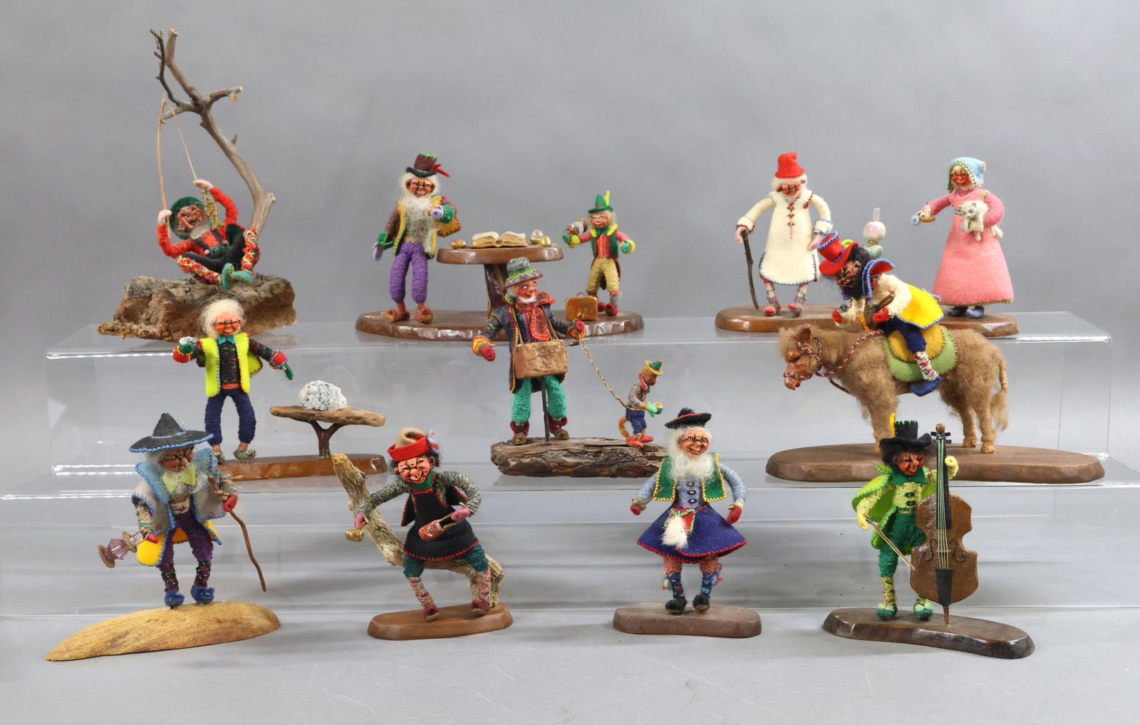 MINIATURE DOLL ARTIST DOLLS.: LOT of character dolls by artist Eulalia S. Stauffer (7/30/1897 - 6/15/1970) of Pacific Grove, CA. All of these characters are 4" - 5". They are all mounted on wooden bases. (7) Are single figures,