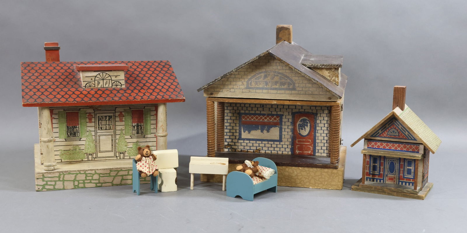 DOLLHOUSES/MINIATURES.: LOT of (3) CONVERSE wood dollhouses with colors lithographed directly on the wood. House 1) 7" T x 5" W x 4 1/4" D. Opens from the front. House 2) 11 1/2" T x 10 1/2" W x 8" D. Opens from the front