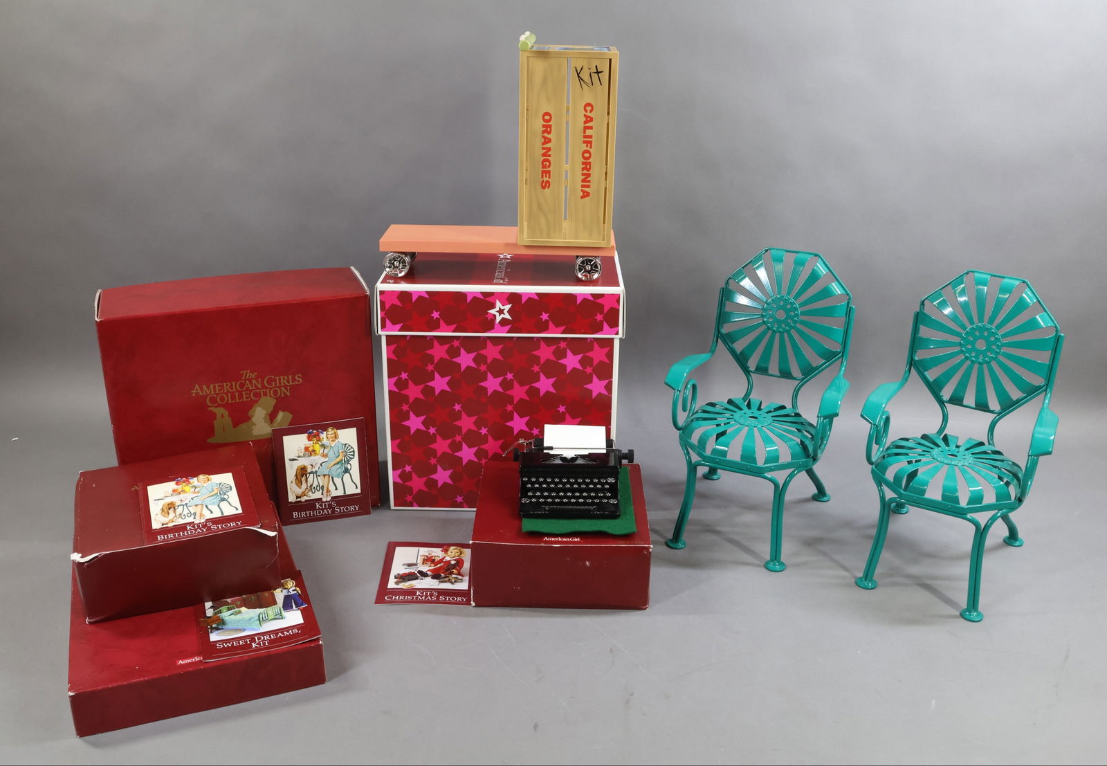 AMERICAN GIRLS.: LOT of KIT. Kit's Homemade Scooter. Pair of Deep Jade Metal Chairs. Glassware & Linens Sets. Party Treats. Metal Typewriter. Tufted Bedding Set. This lot is being sold AS IS.