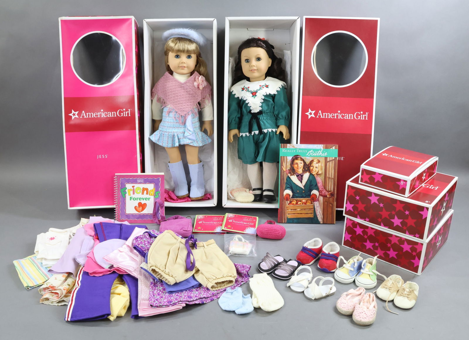AMERICAN GIRLS.: LOT of RUTHIE and JESS. Each doll is in OB w/book. Ruthie comes with (2) Hats. There is a box of misc. Clothing and Accessories. Condition: outfits may not be complete. This lot is being sold AS IS.