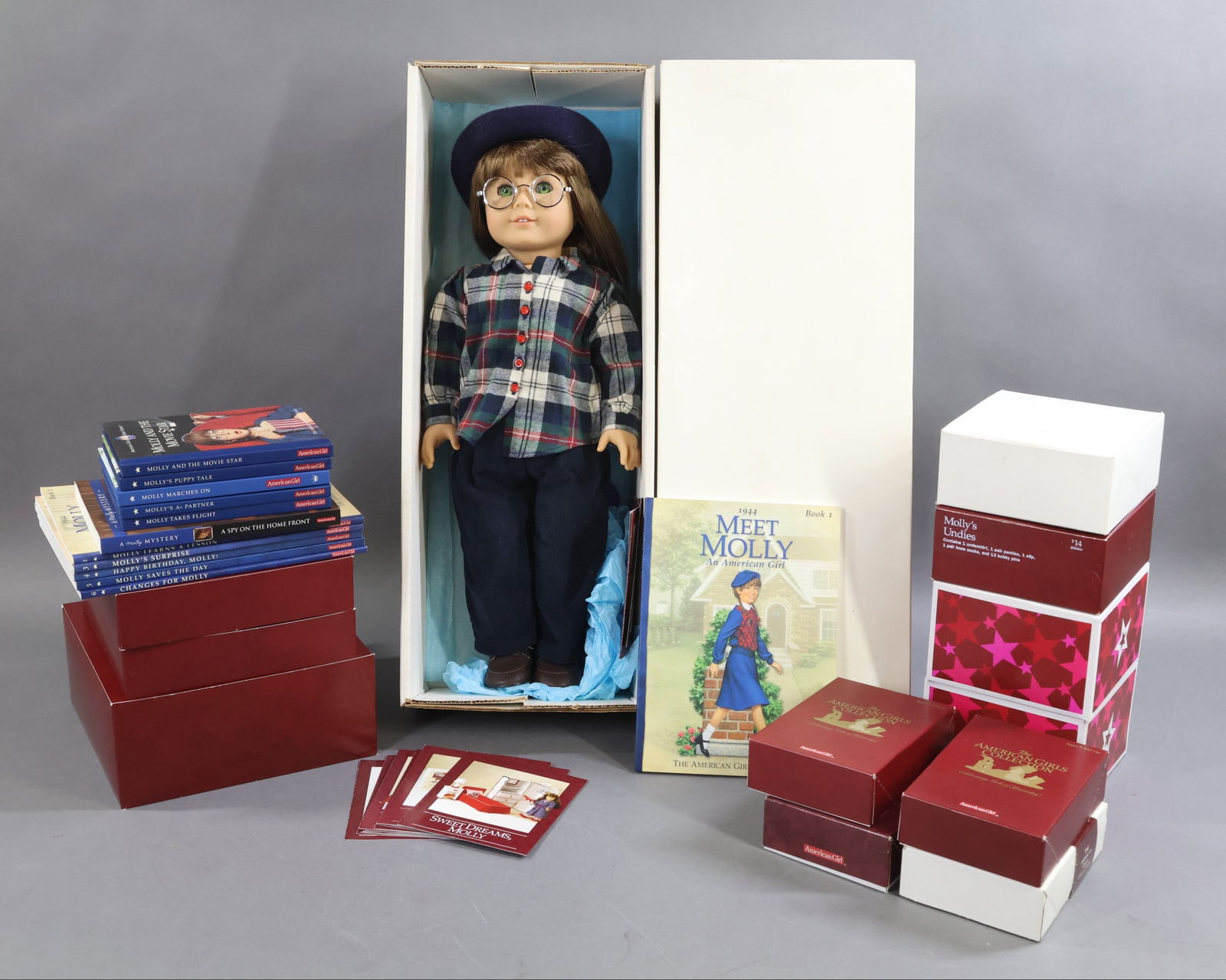 AMERICAN GIRLS.: LOT of MOLLY. Doll in OB w/book. Books 2, 3, 4, 5, 6. (5) Short Stories. (1) Mystery Book. Winter Story Outfit. Aviator Outfit. Dude Ranch Hat, Accessories. Swimsuit. Ice Skates/Muff. Misc. Clothing,