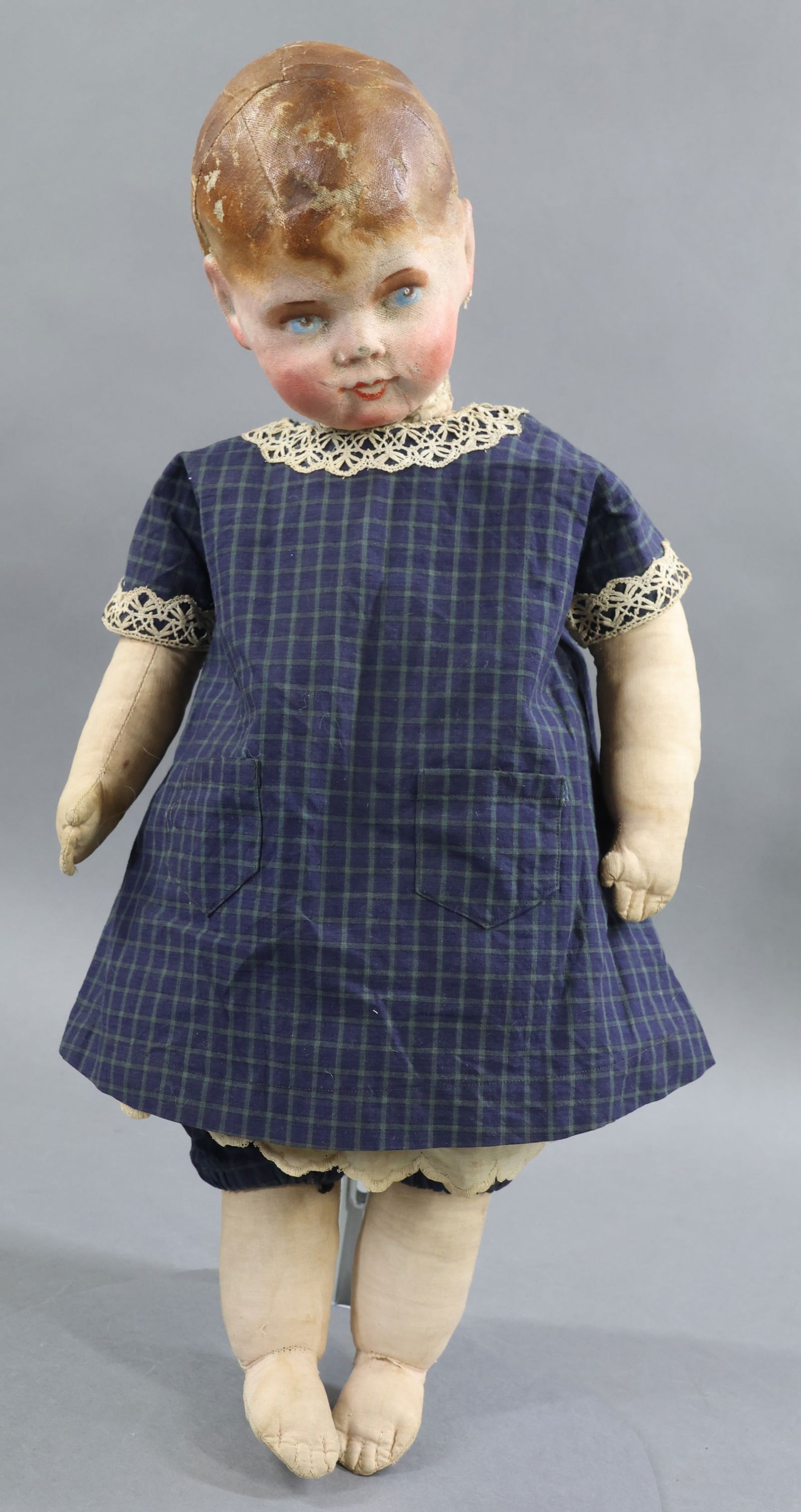 CLOTH DOLLS.: 17" antique French "LaFrancia?" doll. This doll is in the style of Kathe Kruse. The structure is similar to her dolls with the wide hip body. Nicely painted features and hair. Cloth body with similar