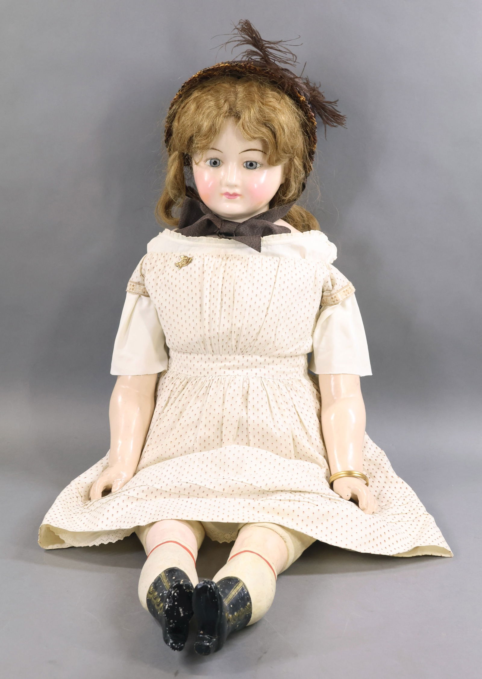 WAX OVER PAPIER MACHE DOLLS.: 40" Beautiful German, life-size child doll. She has a deep shoulder plate, solid dome with stationary blue eyes, closed mouth, brown HH wig. Cloth body with papier mache lower arms and legs with paint