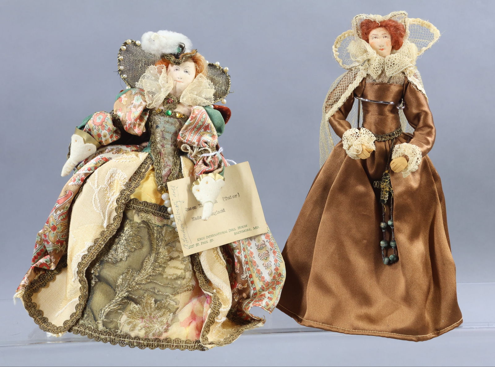 LIBERTY OF LONDON.: Pair of tagged dolls. "Queen Elizabeth I", Ruled 1558-1603. She was a Tudor. "Mary Queen of Scots" Queen of Scotland. She was a Stuart. She ruled from December 1542 until her forced abdication in 1567
