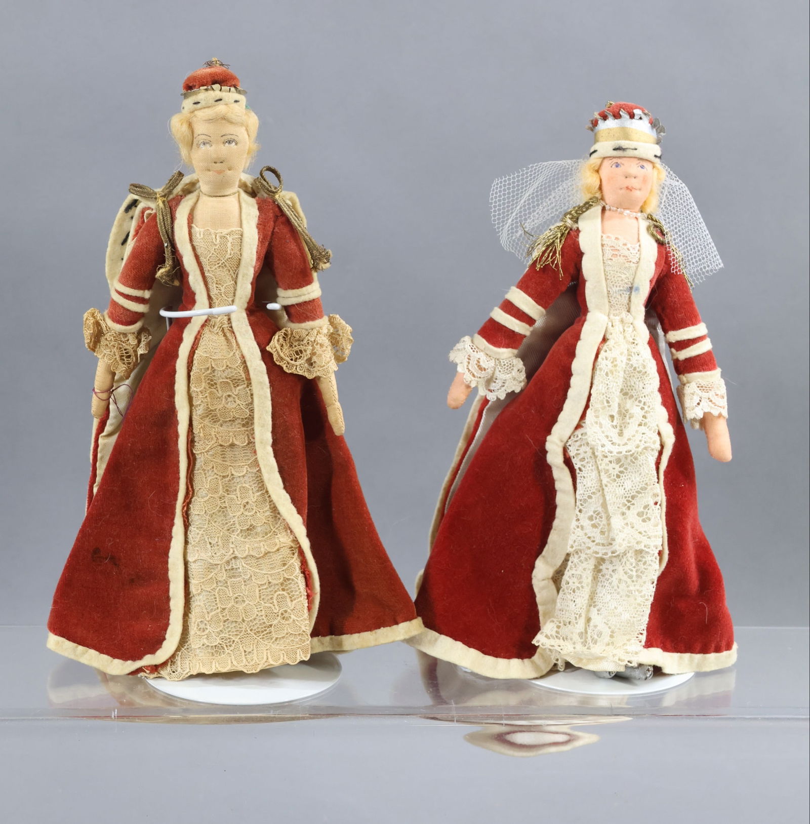 LIBERTY OF LONDON.: Pair of tagged dolls. "Lady Alice" , 1936 Coronation. "Lady Alice" Mother of Phillip. (2) Stands. Condition: age loss, fading. This lot is being sold AS IS.