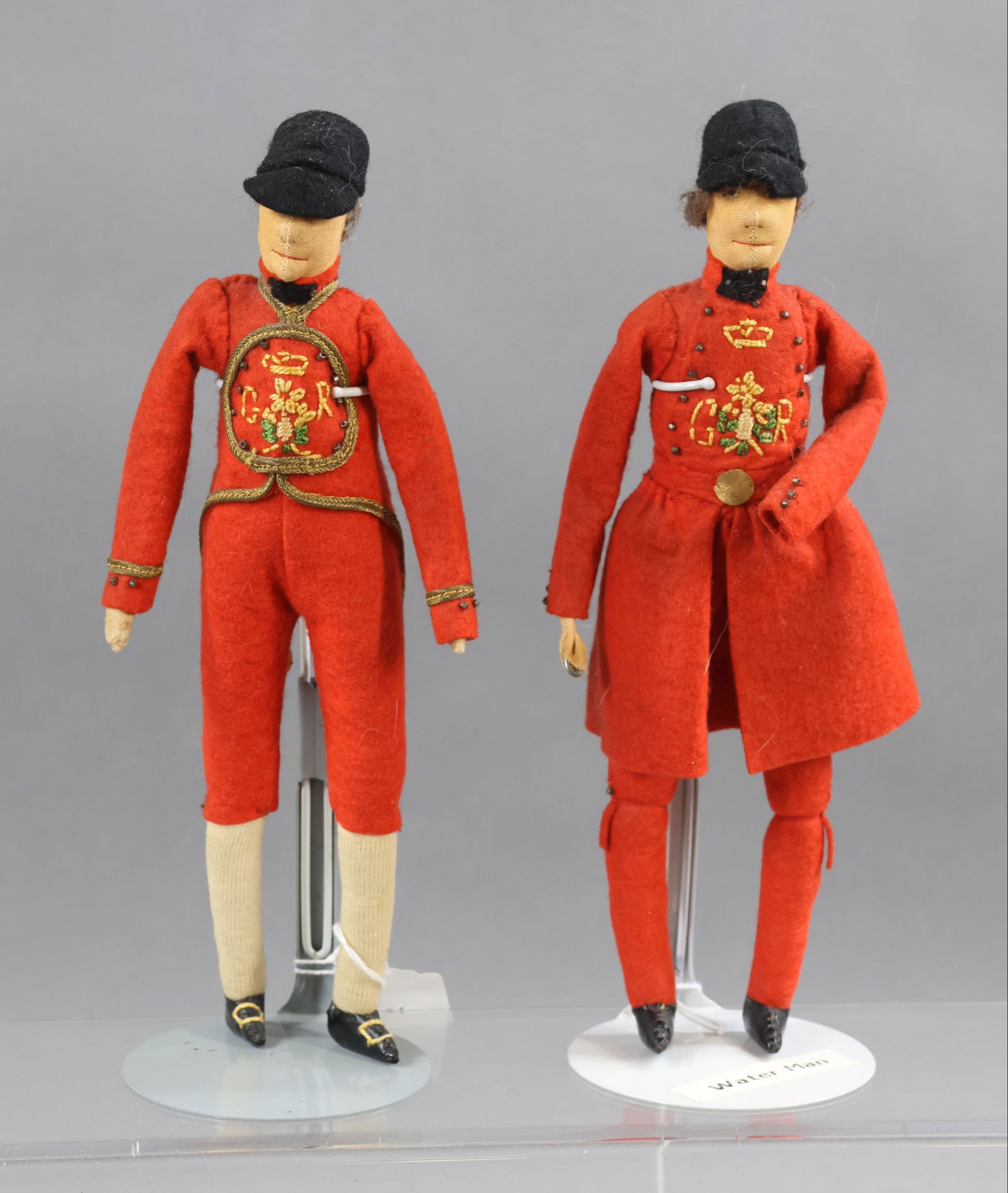 LIBERTY OF LONDON.: Pair of tagged male dolls from 1936 Coronation. "King's Barge Master" and "Royal Waterman". The Barge Master is responsible for the Royal Watermen, chosen from the ranks of the Thames Watermen who ope