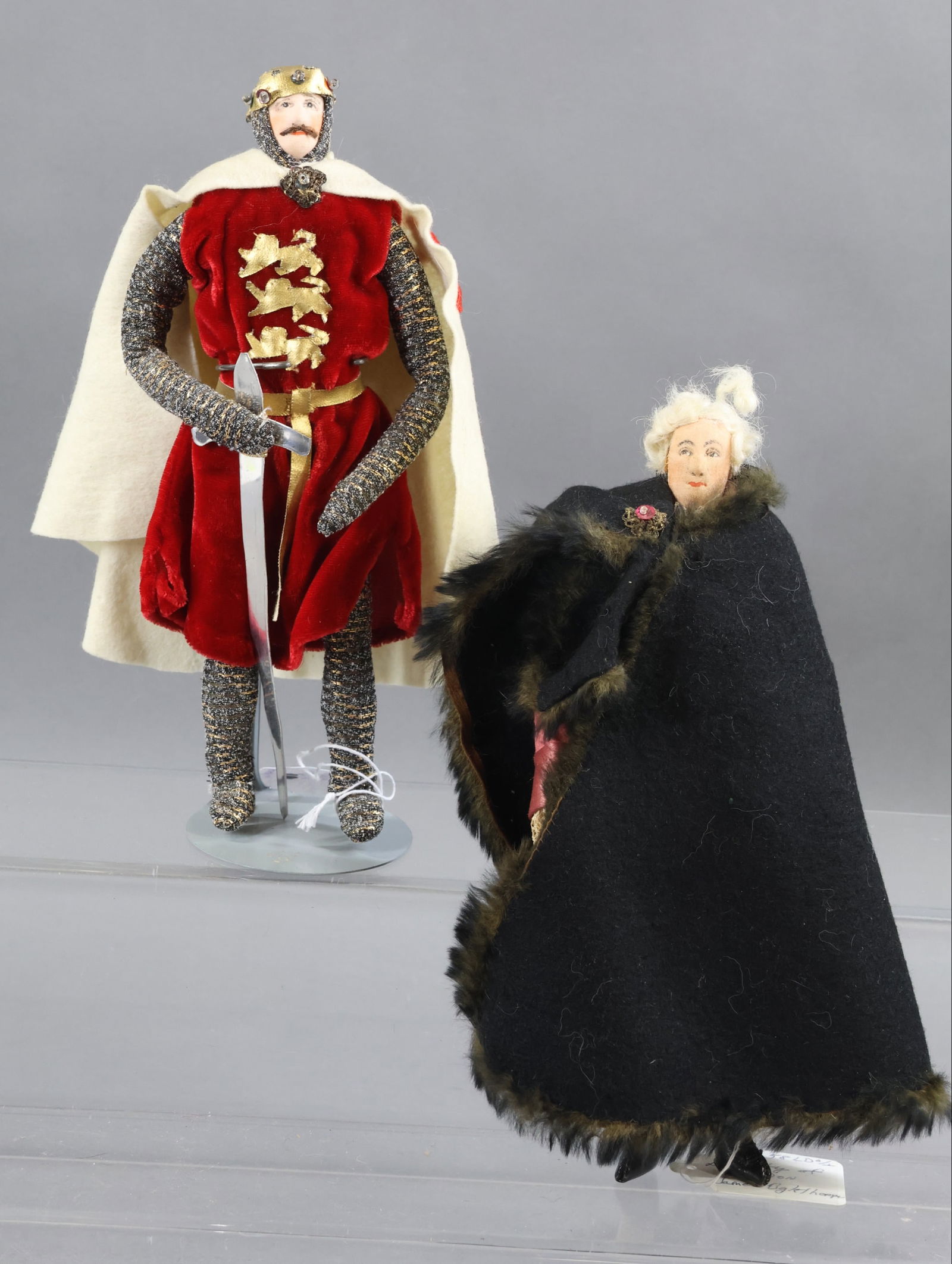 LIBERTY OF LONDON.: Pair of tagged male dolls. "Richard The Lionhearted" also known as "Richard I", 1189-1199. Tag reads: A Plantagenet King. (A Royal house originating rom Anjou, France, ruled England from 1154-1485.) "