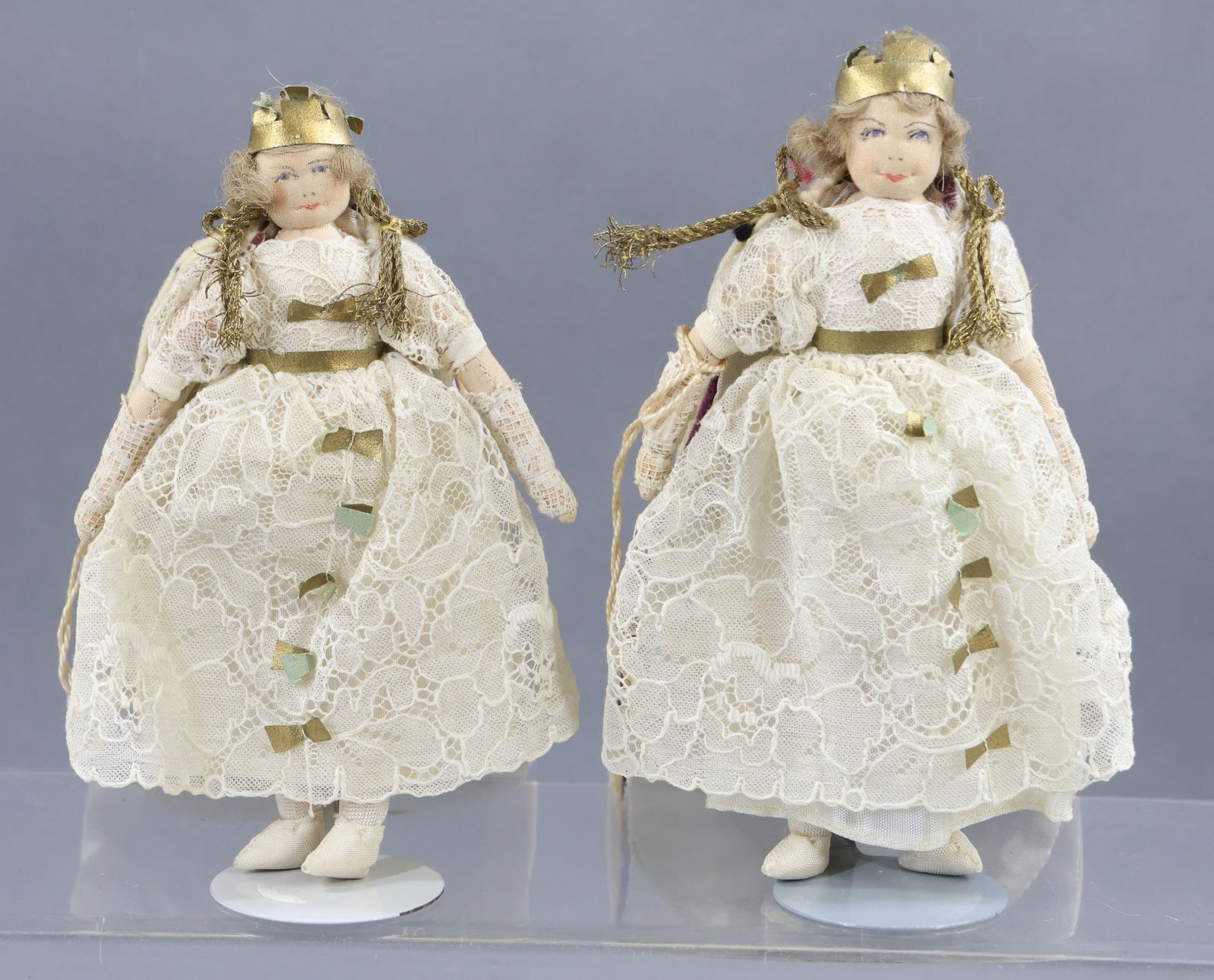 LIBERTY OF LONDON.: Pair of tagged 6"-6 1/4" "Royal Children" dolls. "Princess Elizabeth" and "Princess "Margaret". (2) Stands. Condition: nothing observed. This lot is being sold AS IS.