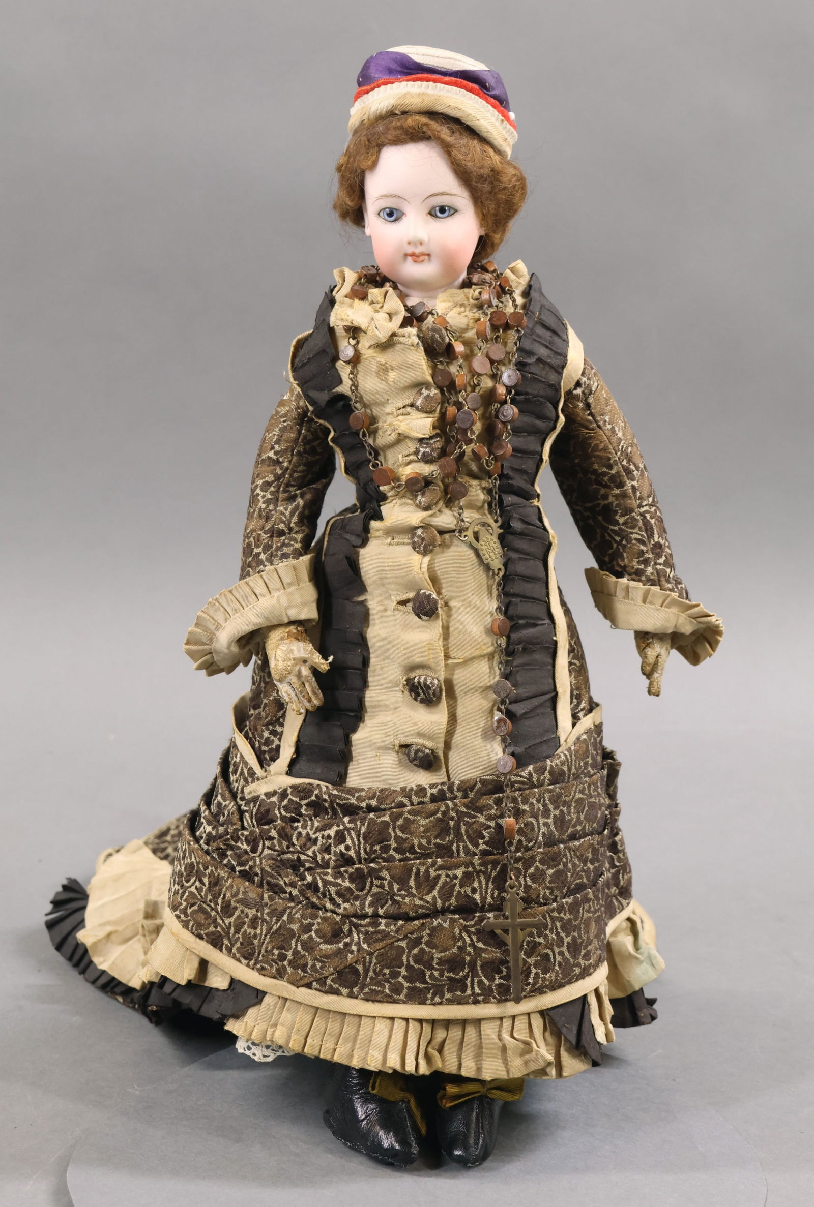 ANTIQUE FRENCH BISQUE HEAD DOLL.: 13" "1" (F G?) French Fashion Doll. Blue paperweight eyes, closed mouth, pierced ears, henna mohair wig. Socket head on a bisque shoulder plate. White leather gusseted body. Hands have individual wire