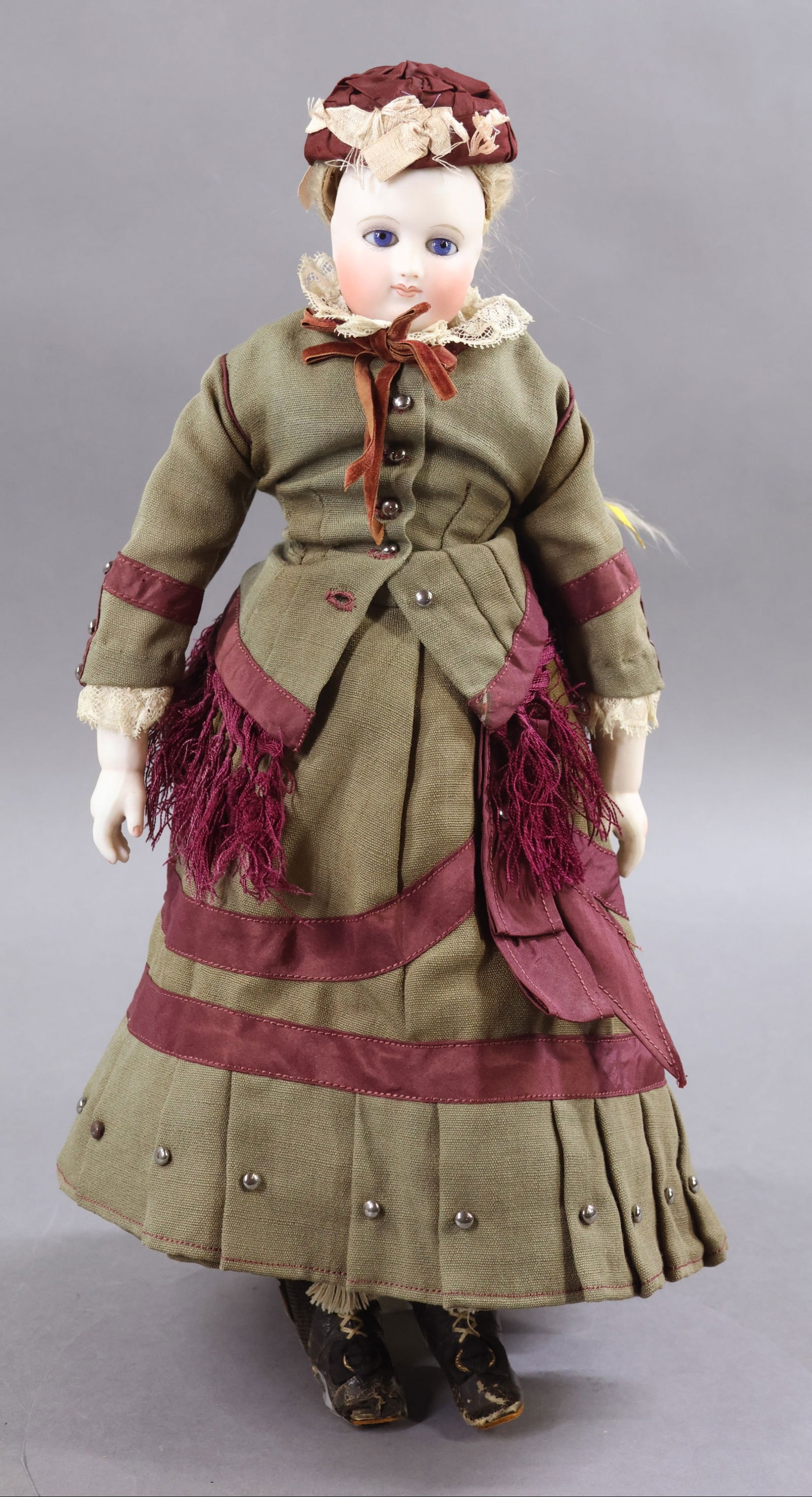 ANTIQUE FRENCH BISQUE HEAD DOLL.: 15" Unmarked French Fashion Doll. Blue paperweight eyes, closed mouth, antique long blonde braided mohair wig. This is a shoulder head doll. White leather gusseted body with 1 pc. bisque arms, beautif