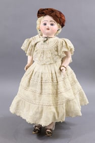 ANTIQUE FRENCH BISQUE HEAD DOLL.