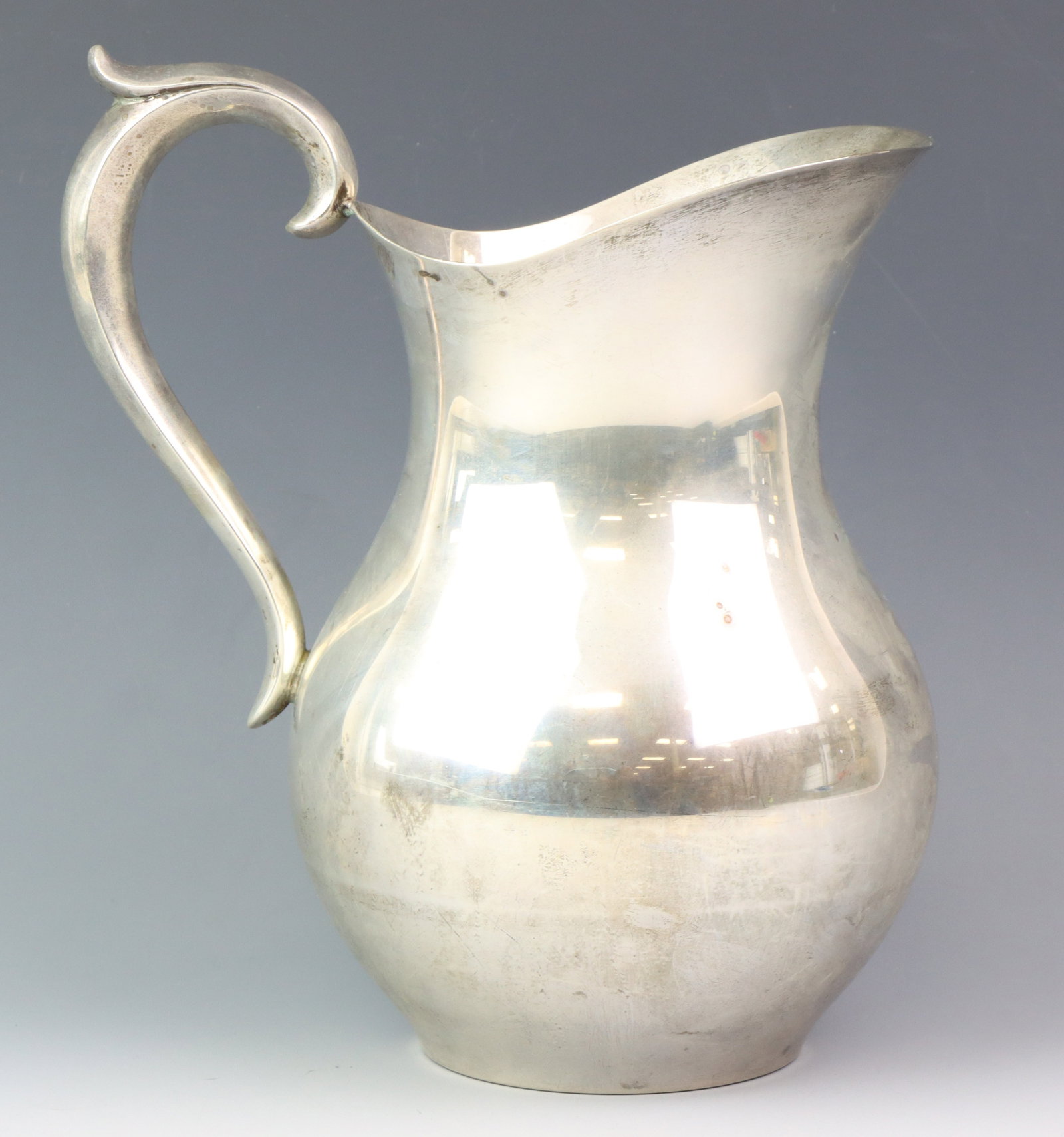 Gorham "Mrs. America" Sterling Silver Pitcher: American sterling silver 3 1/4 pint pitcher, with a 1962 date mark. 8.5”h x 5.5”w x 7”d, and 15.96 ozt