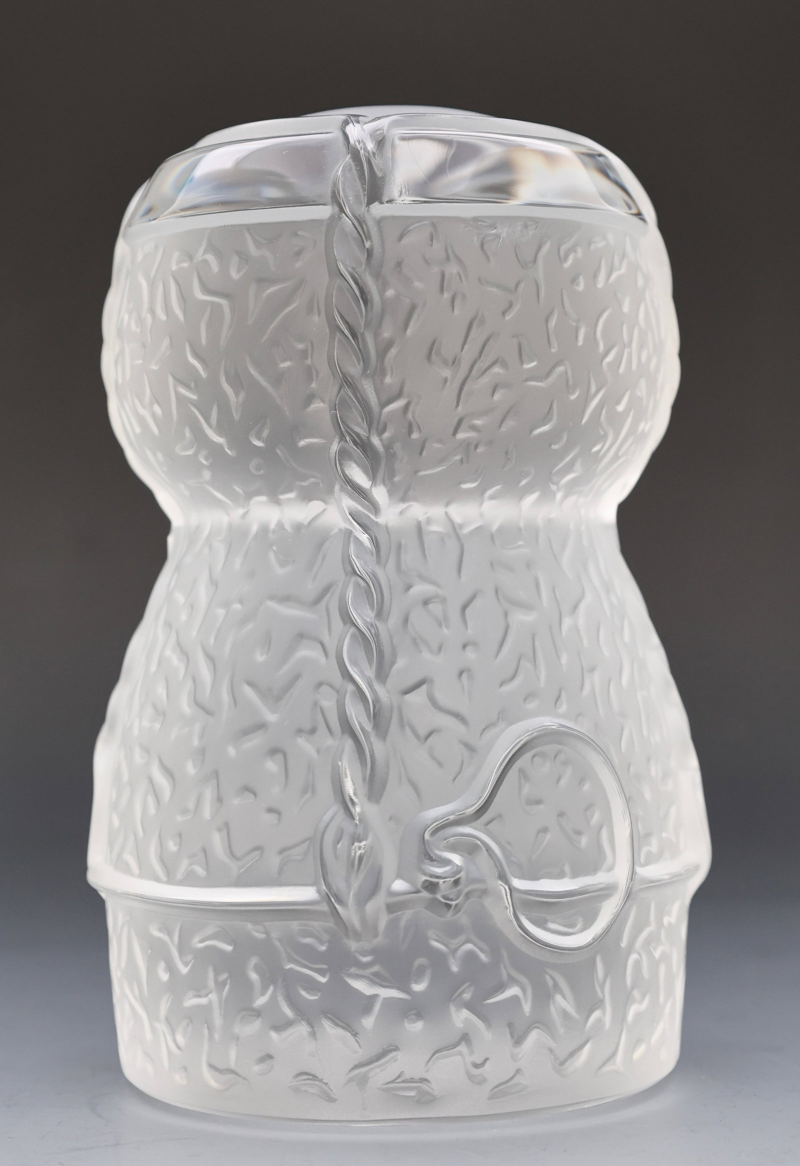 Lalique “Epernay?? Crystal Paperweight: French crystal paperweight, textured frosted glass in the form of a champagne cork. Engraved mark to the foot. 5.5”h x 3.25”w