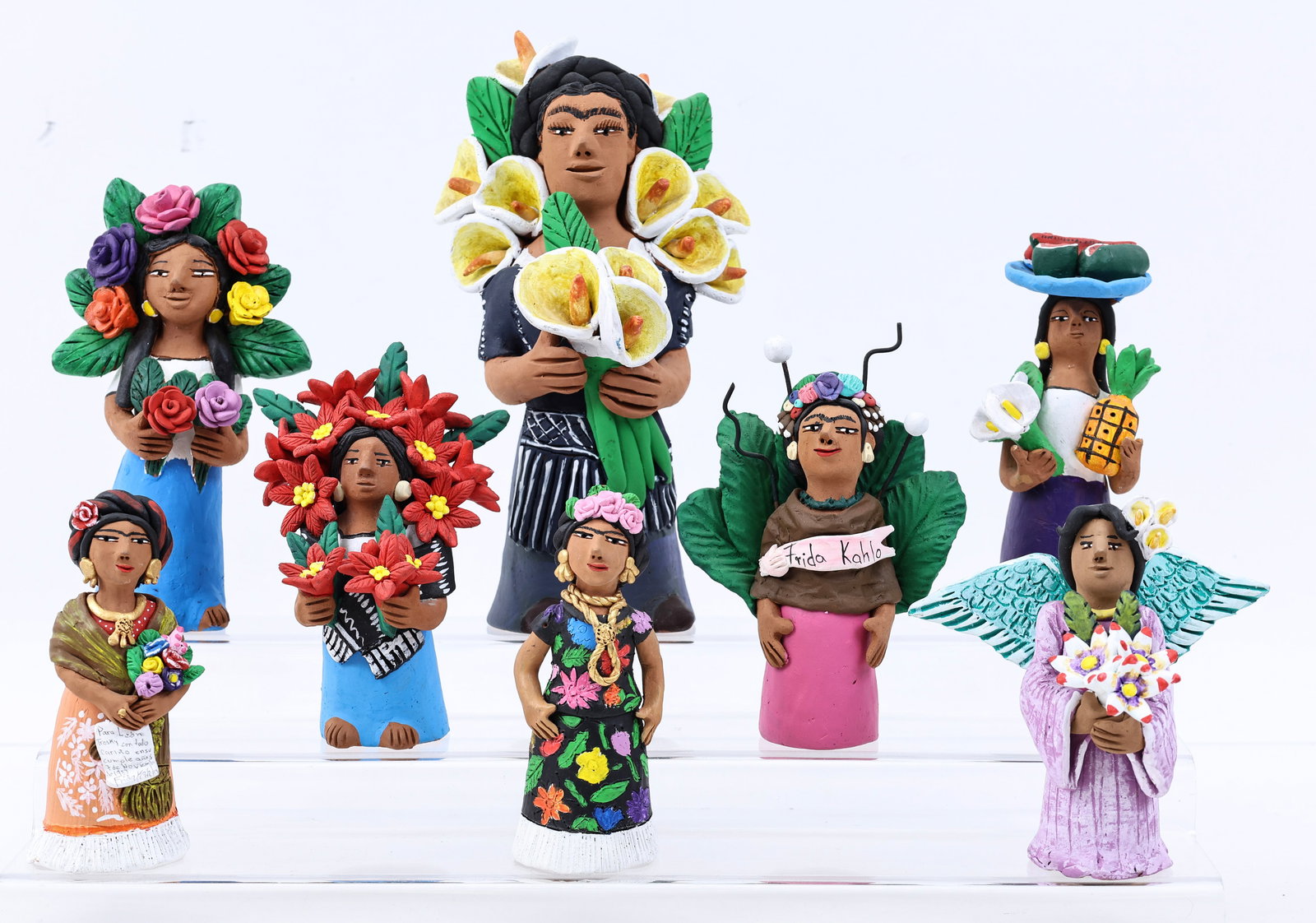 Josefina Aguilar (B. 1945): Mexican pottery figures, representing Frida Kahlo paintings. Each with an impressed signature to the interior. (8) figures. Sizes range from 5.75"h to 9.75"h