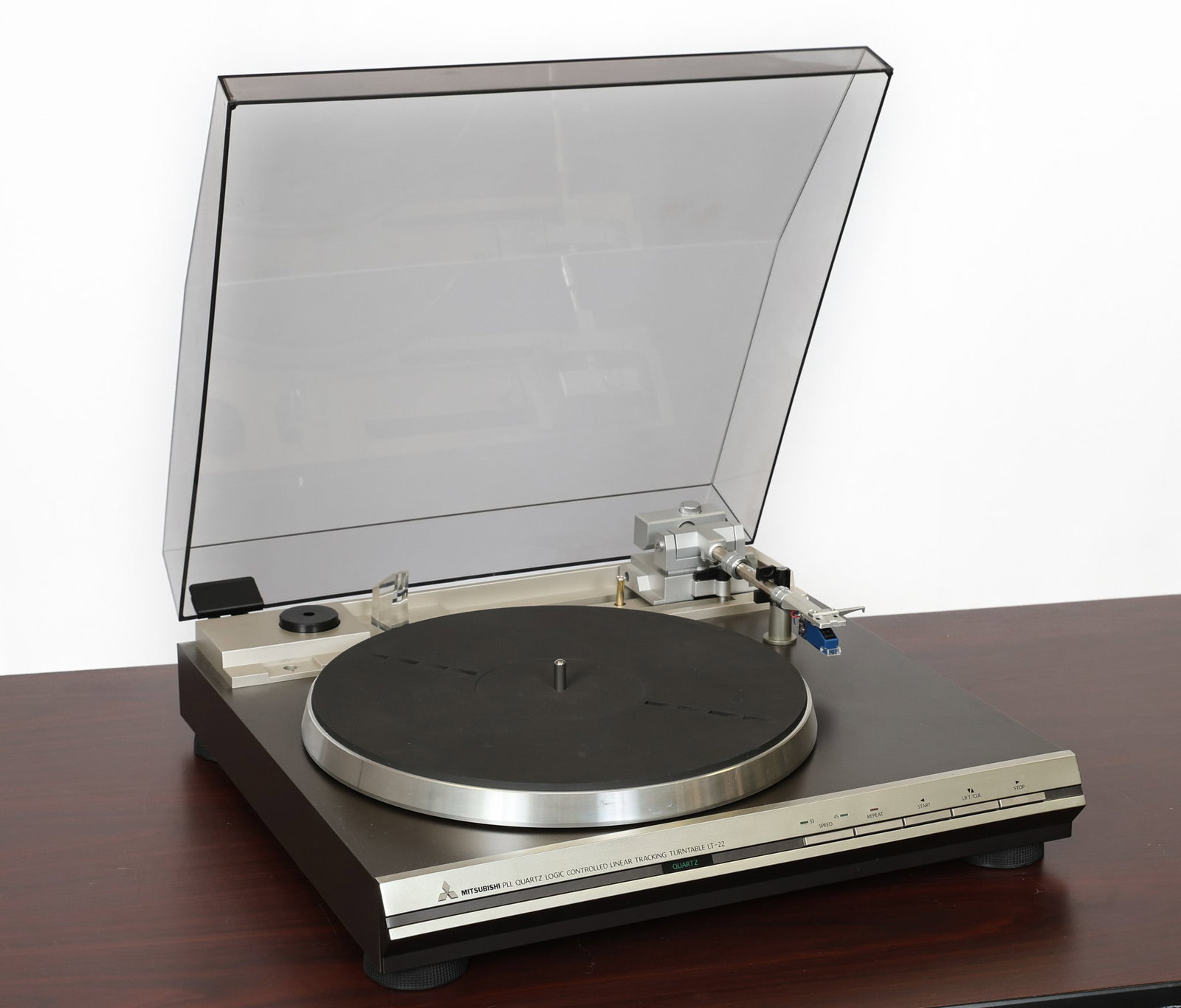 Mitsubishi LT-22 Turntable: Serial No. US 15319, 120V, 60 Hrz, 14W. Owner's manual included. 17"h (Open) x 16.5"w x 16"d