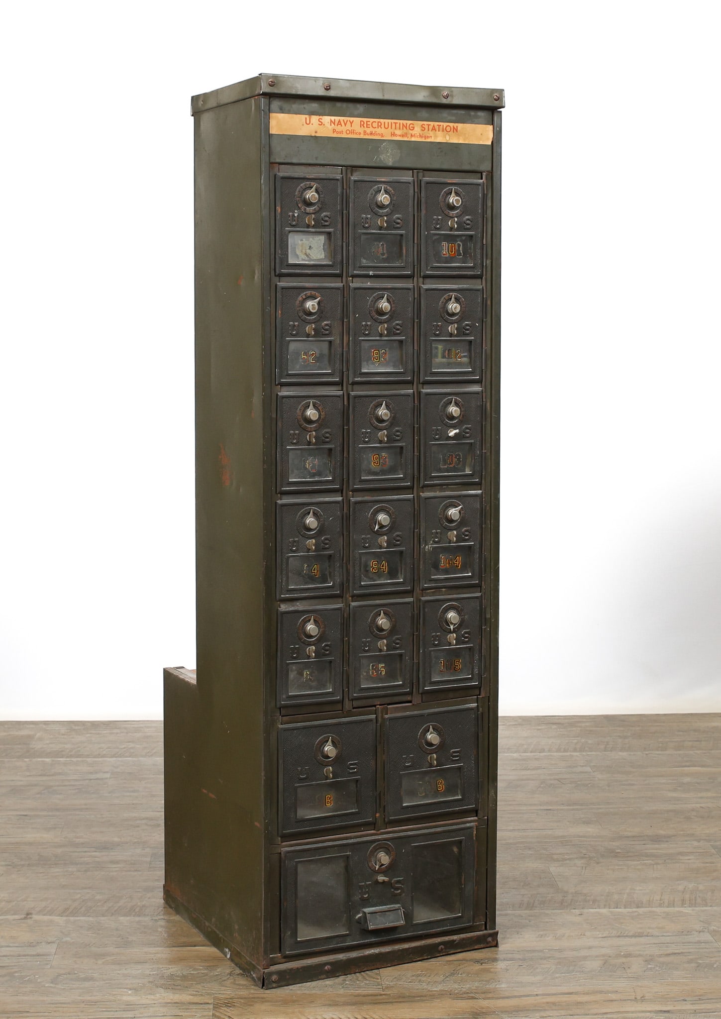 U.S. Navy Post Office Box: Steel green painted 18 compartment P.O. Box assigned to the Post Office Building at the U.S. Navy Recruiting Station in Howell, Michigan. 46"h x 14"w x 15"d