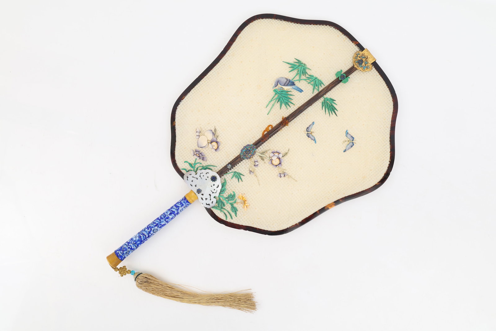 Imperial Tribute Fan, Guangzhou, Qianlong: Qing dynasty, Qianlong period. The plaited ivory leaf is set within a lobed tortoiseshell frame and divided by a narrow bamboo spine. At the upper end the bamboo is fitted with a gilt metal ruyi head