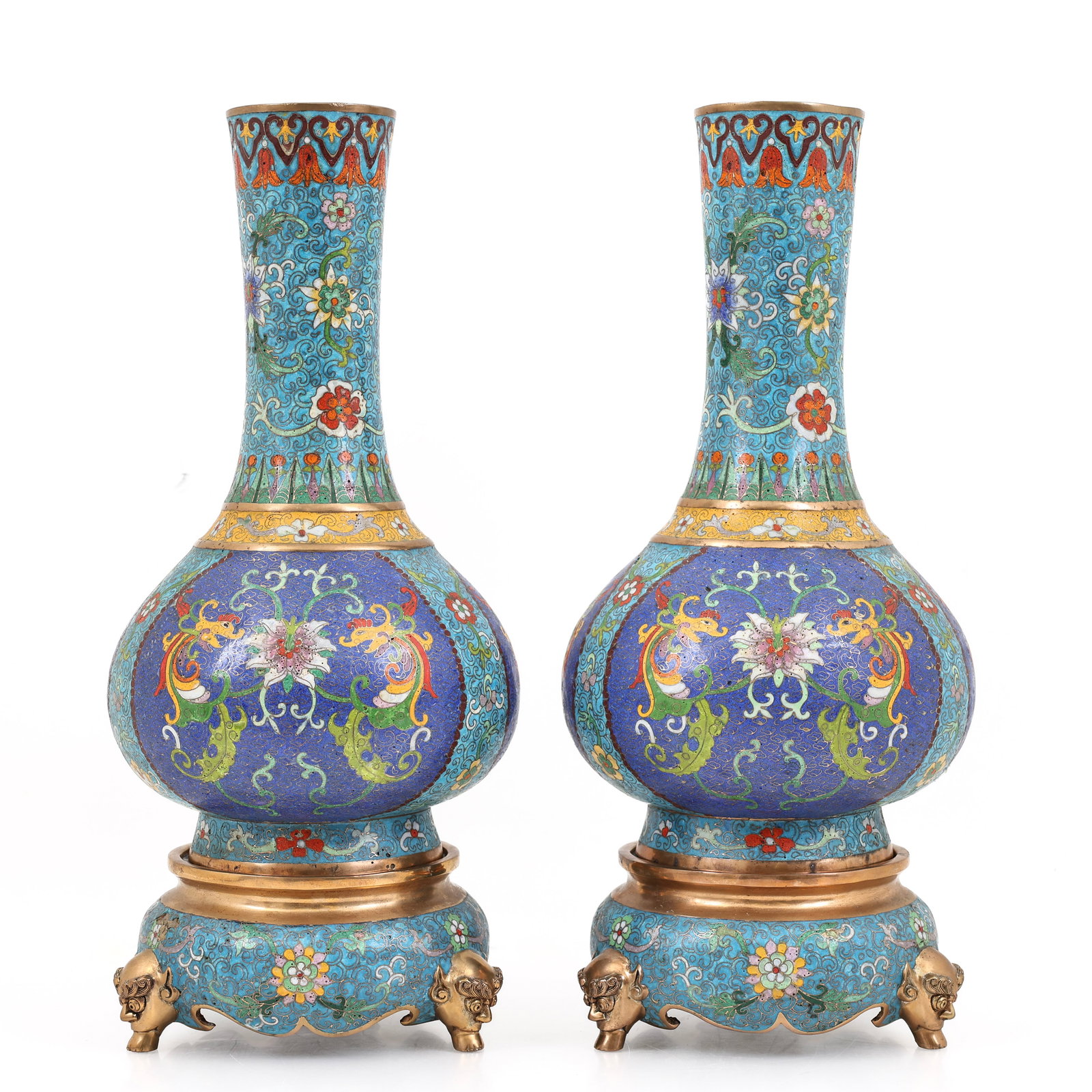 Chinese Cloisonne Vases With Stands: Republic era pair of cloisonne vases decorated on each side with panels depicting lotus flowers flanked by stylized confronted phoenixes, surrounded by floral, scroll, and ruyi motifs, each sitting on