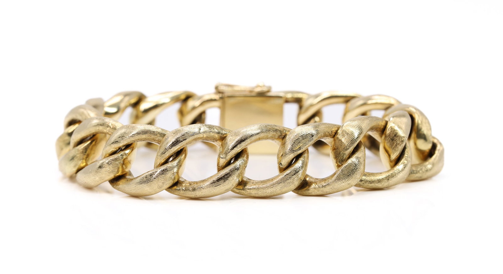 14k YG Bracelet: 14k yellow gold curb link bracelet, 7.75", 44.7dwt.