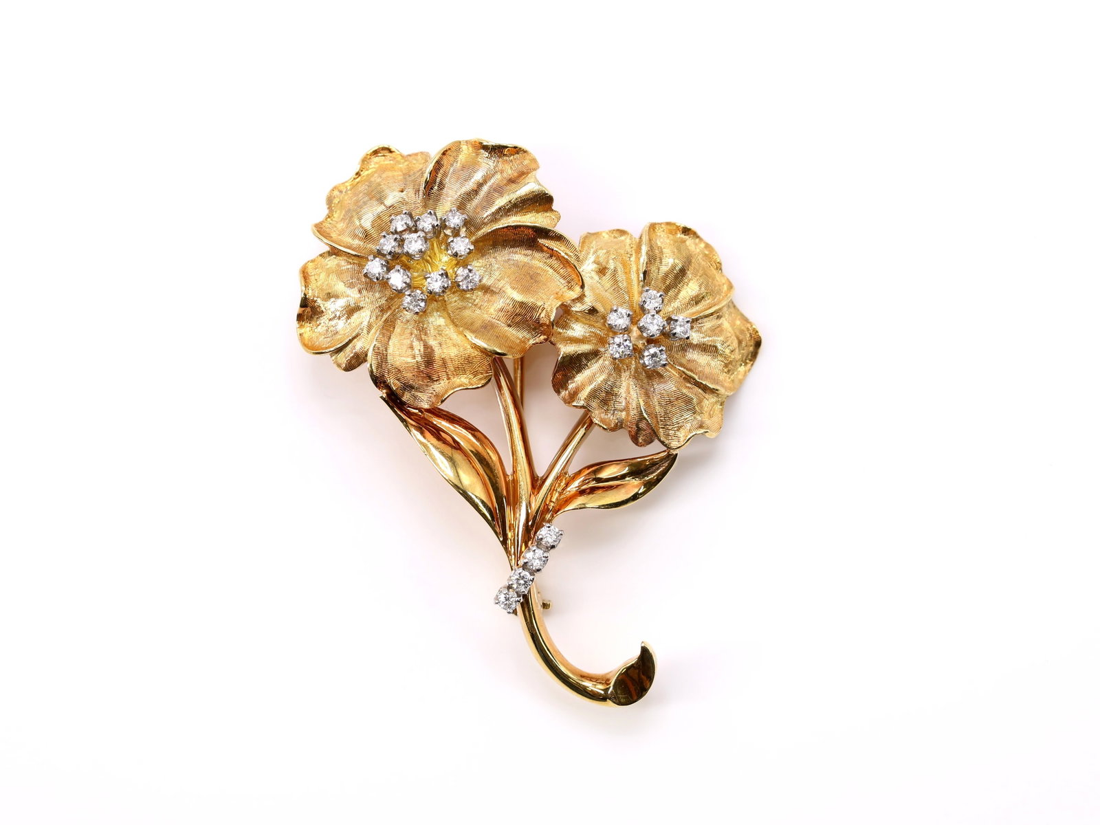18k YG Diamond Pin: 18k yellow gold two flower pin set with (21) round diamonds totaling approximately .53 carat, G color, SI1 clarity, 2.25" and 12.5dwt.