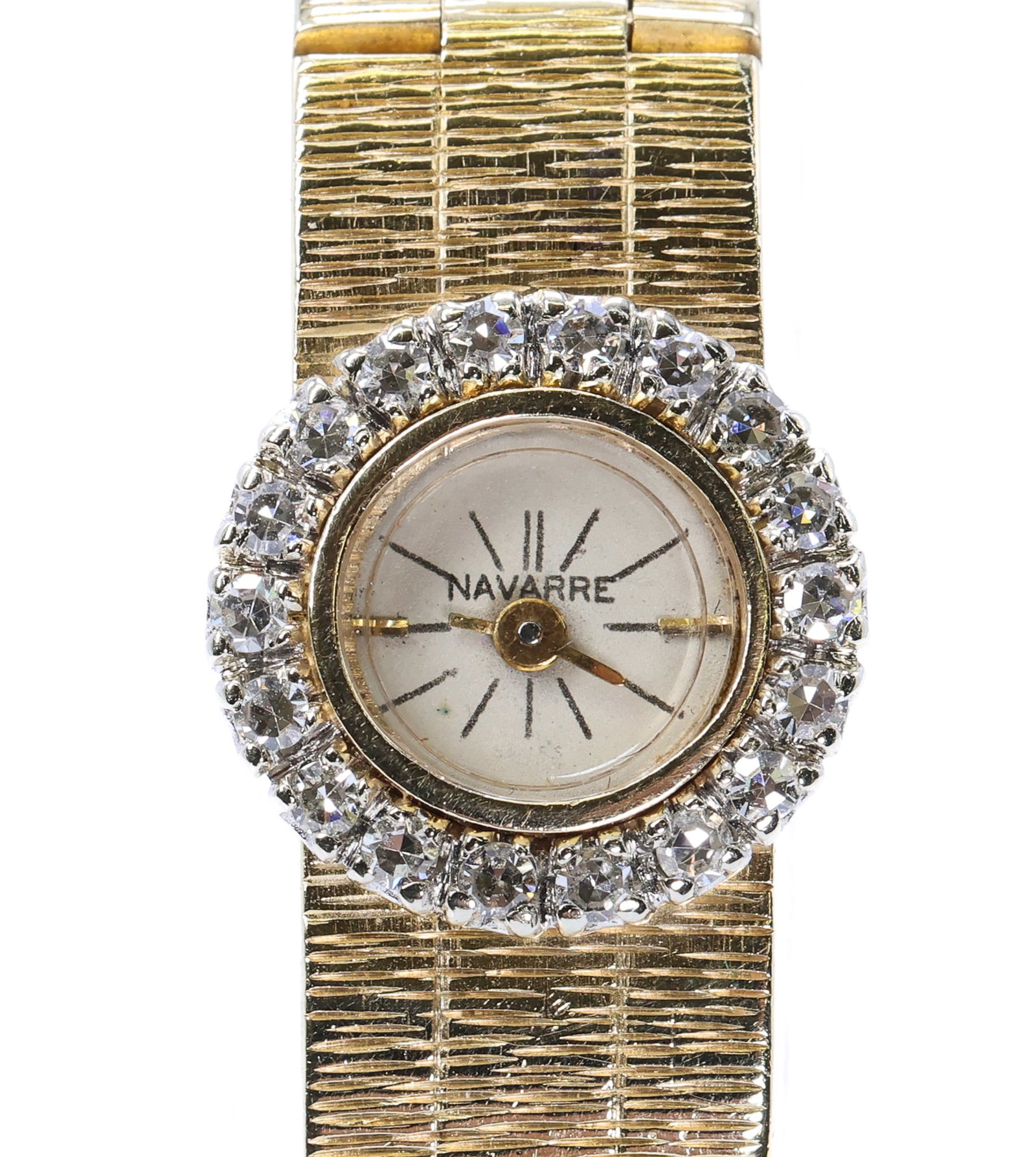 Navarre 14k Diamond Wristwatch: Navarre 14k yellow gold ladies wristwatch with 18 single cut diamonds, approximately .36ctw, 6.5", 16.8dwt.