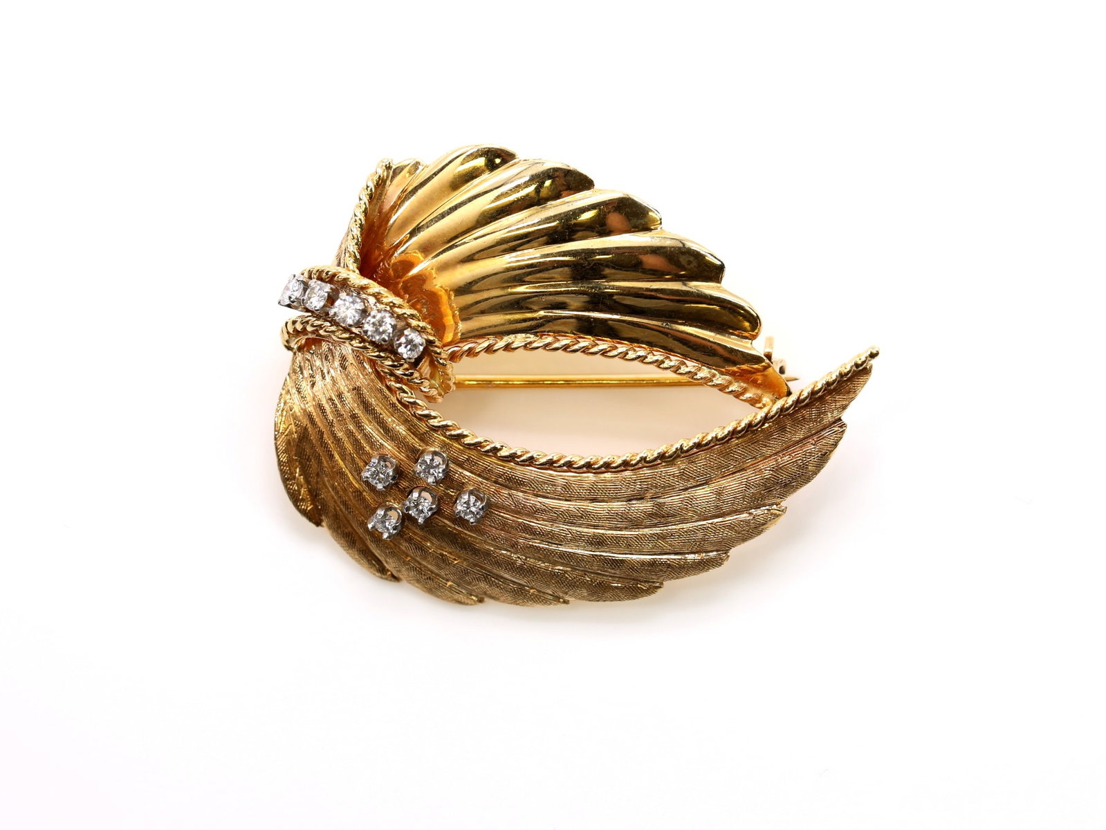 14k YG Diamond Pin: 14k yellow gold two wing style pin set with (10) round brilliant diamonds totaling approximately .30 carat, H color, SI1 clarity, 1.75", 8.2dwt.